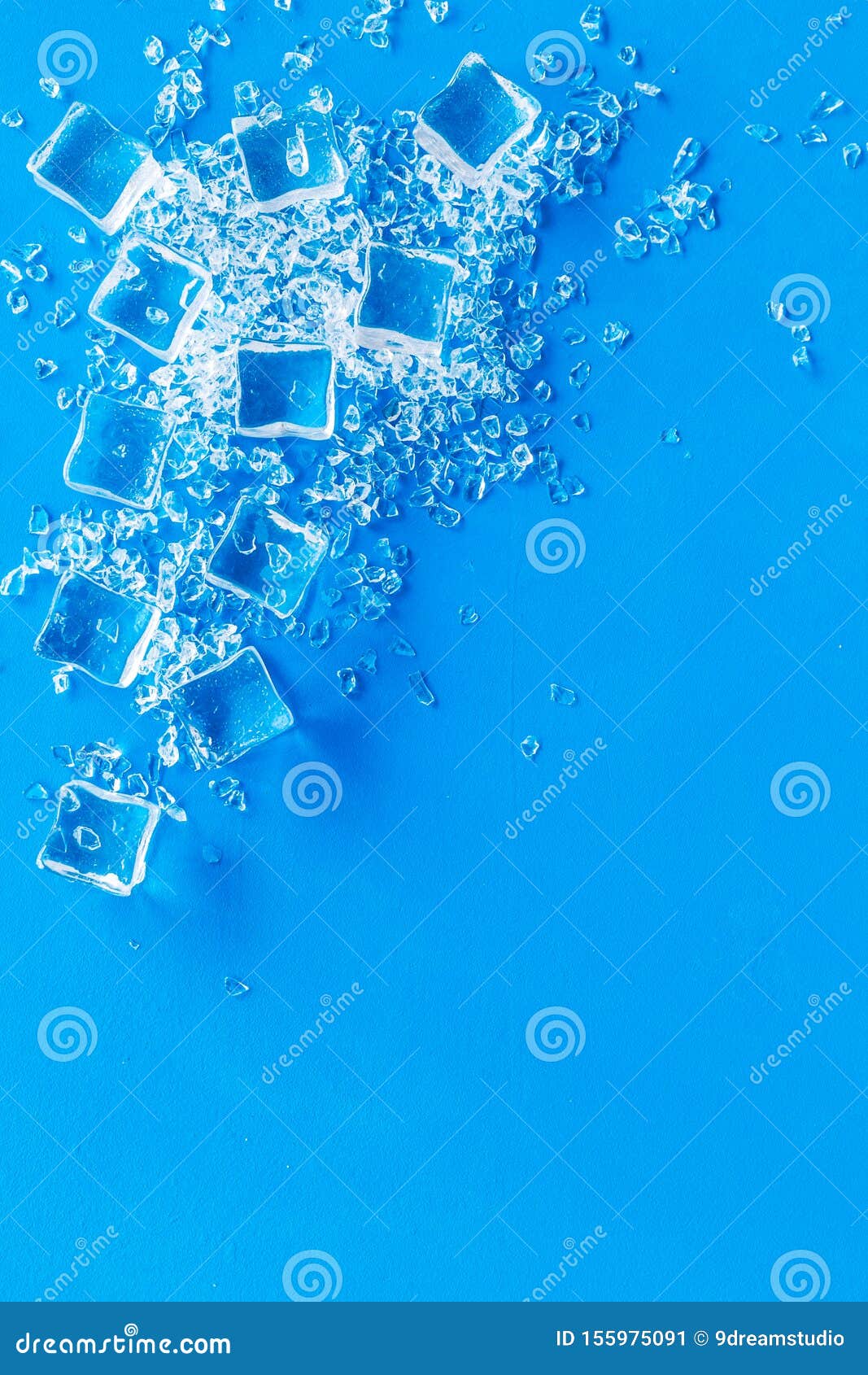 Download Pile Of Ice Cubes On Blue Bar Desk Background Top View ...