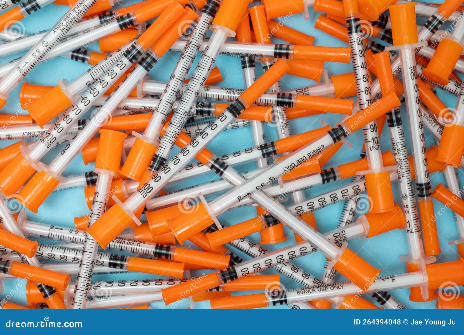 Pile of Insulin Needles with Orange Caps Stock Photo Image of pile