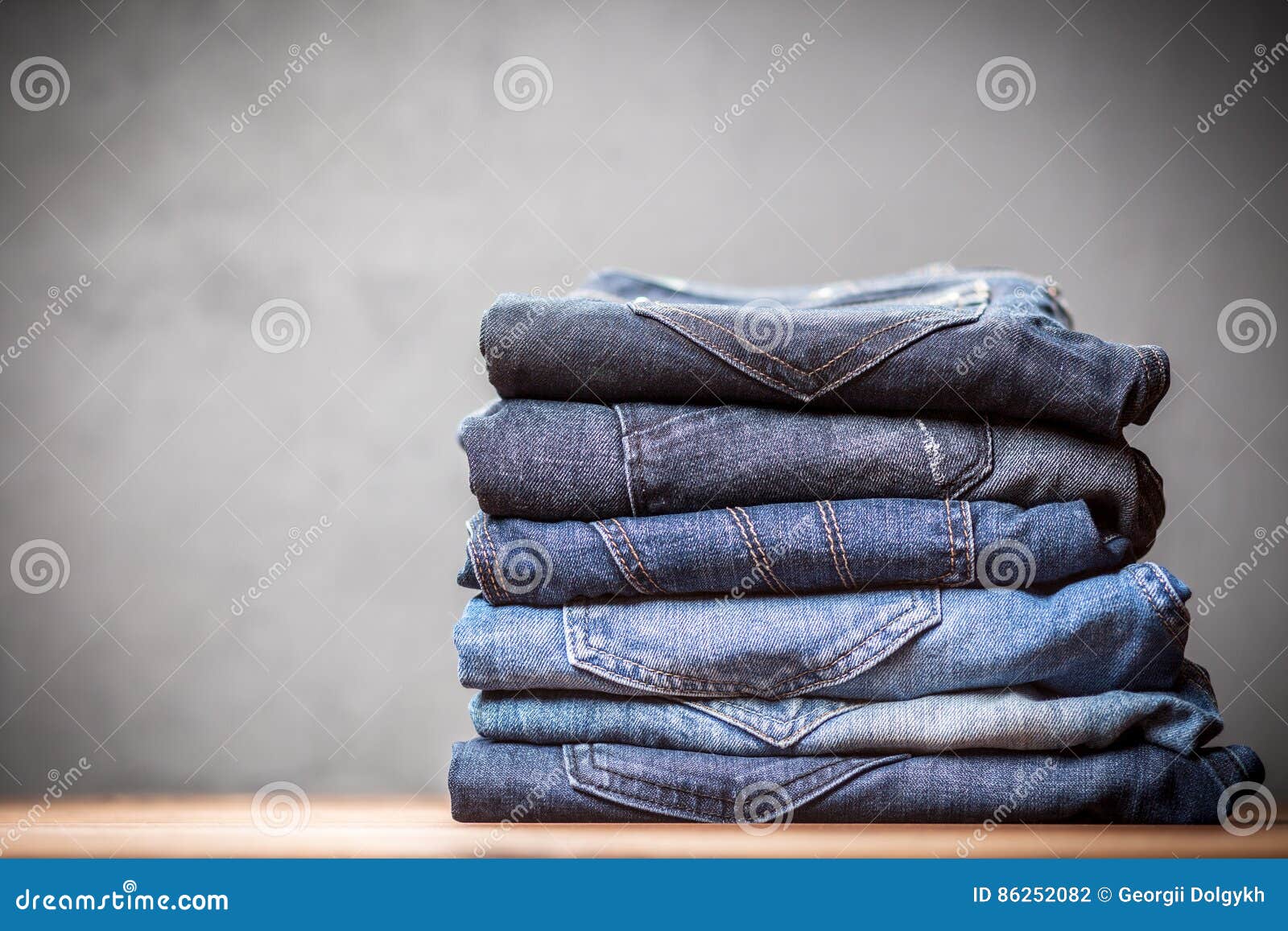 Pile of jeans stock photo. Image of garment, jeans, background - 86252082