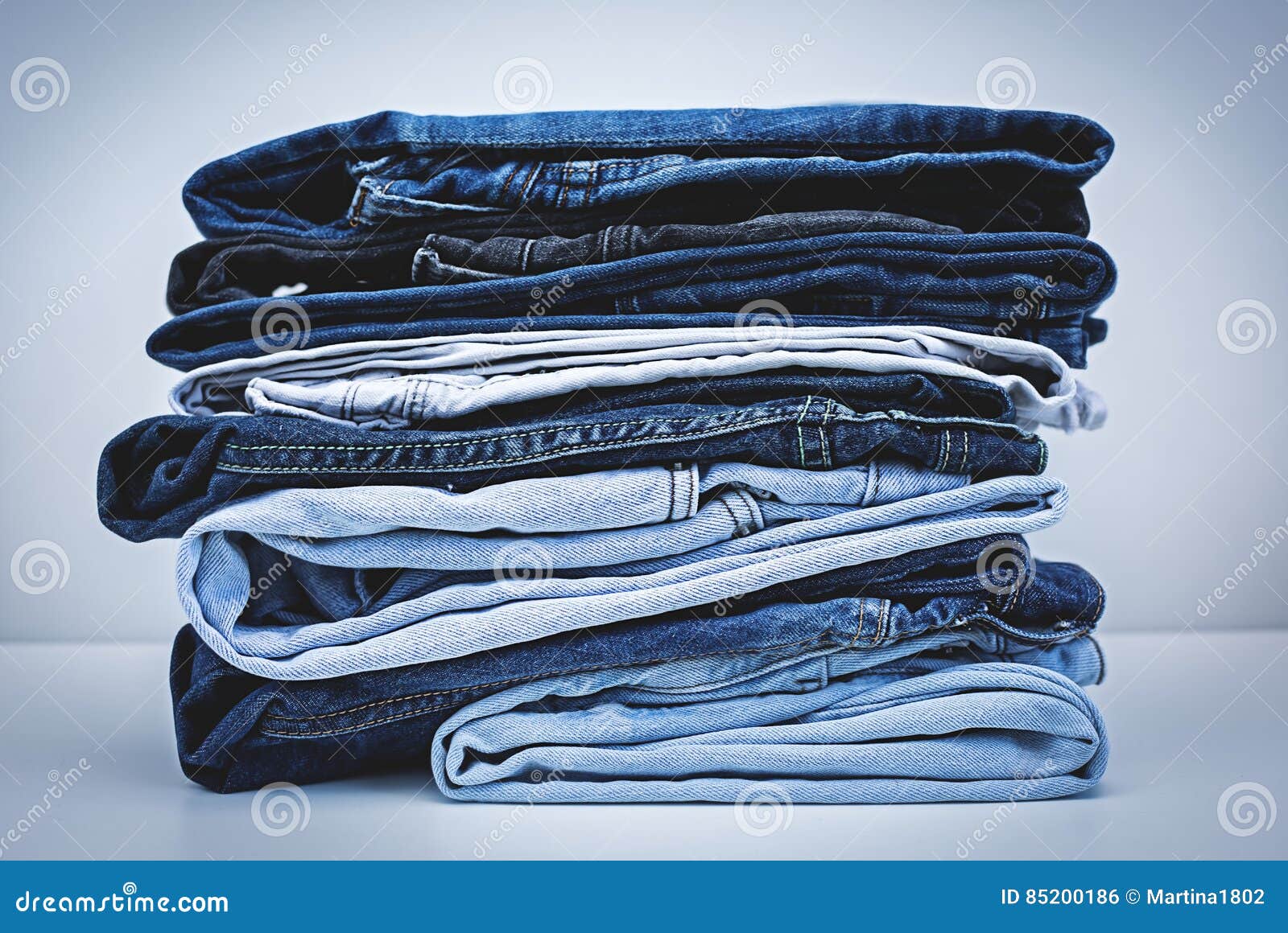 Pile of Jeans stock photo. Image of fashion, people, denim - 85200186