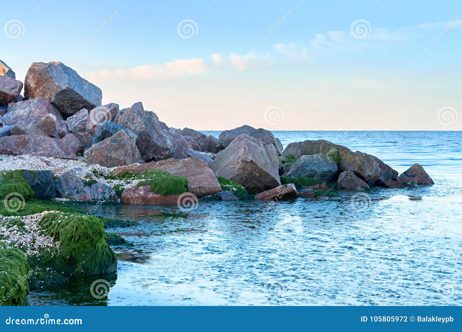 Pile of Large Stones on the Beach Stock Photo Image of green, coastal
