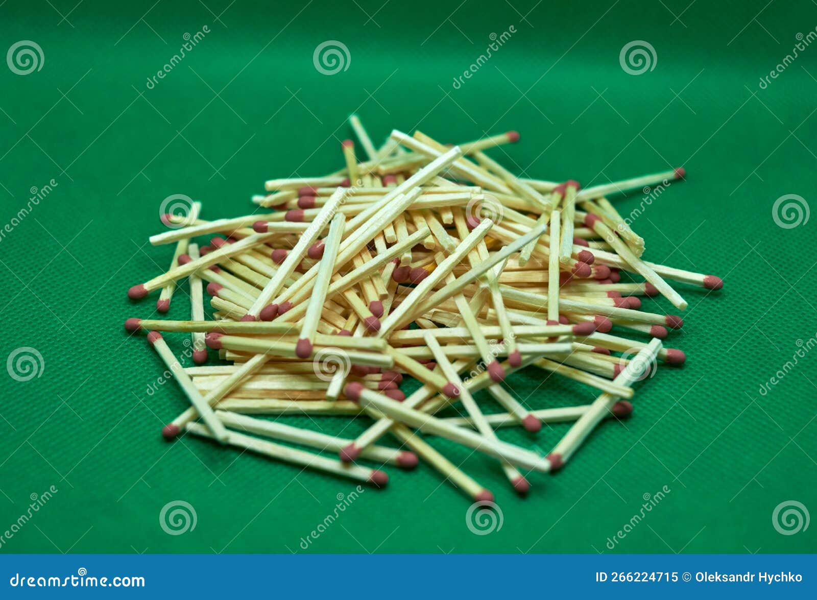A Pile of Matches on a Green Background Stock Image Image of closeup