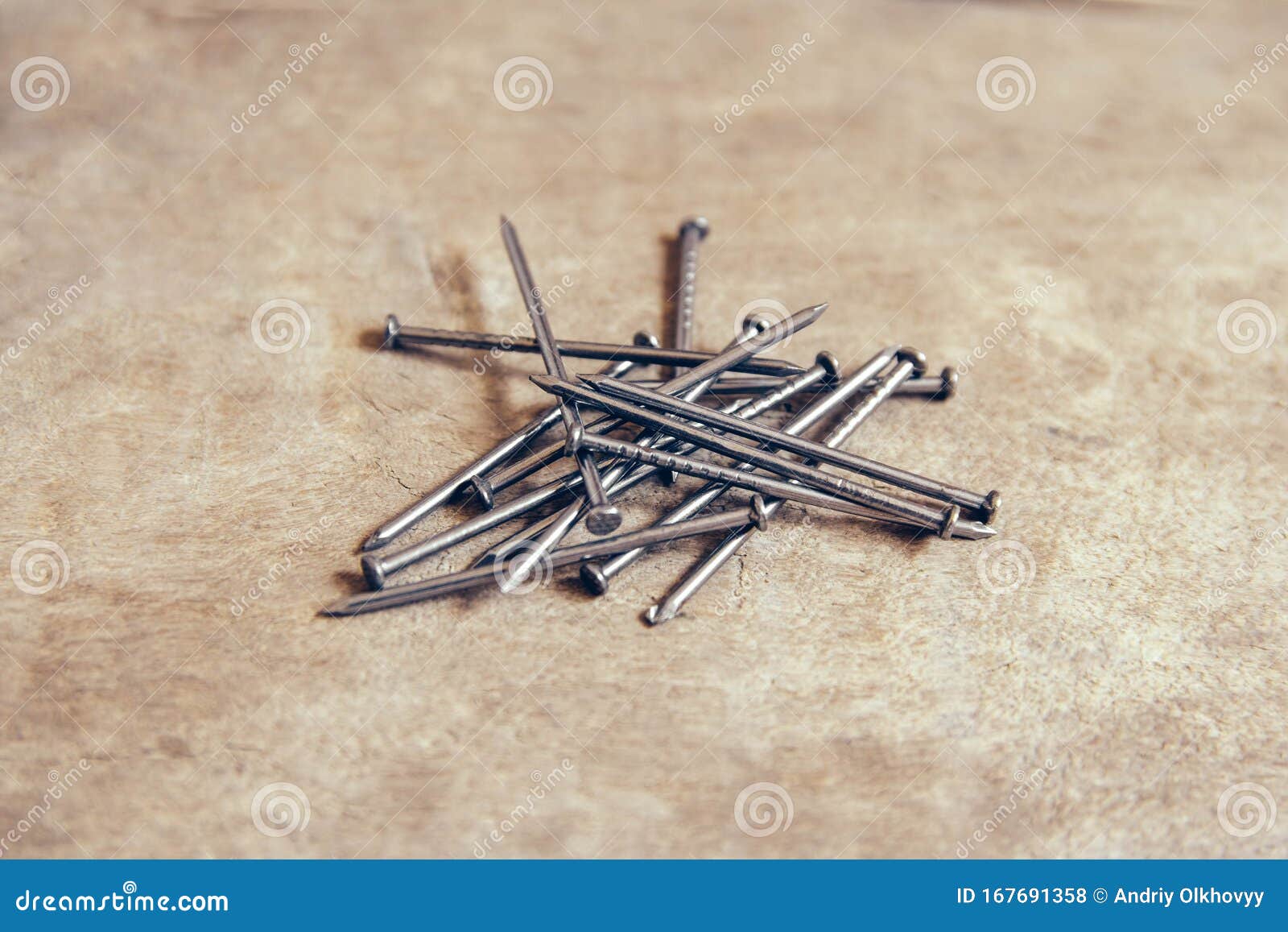 Pile Of Metal Nails On Wooden Background Stock Photo - Image of iron ...