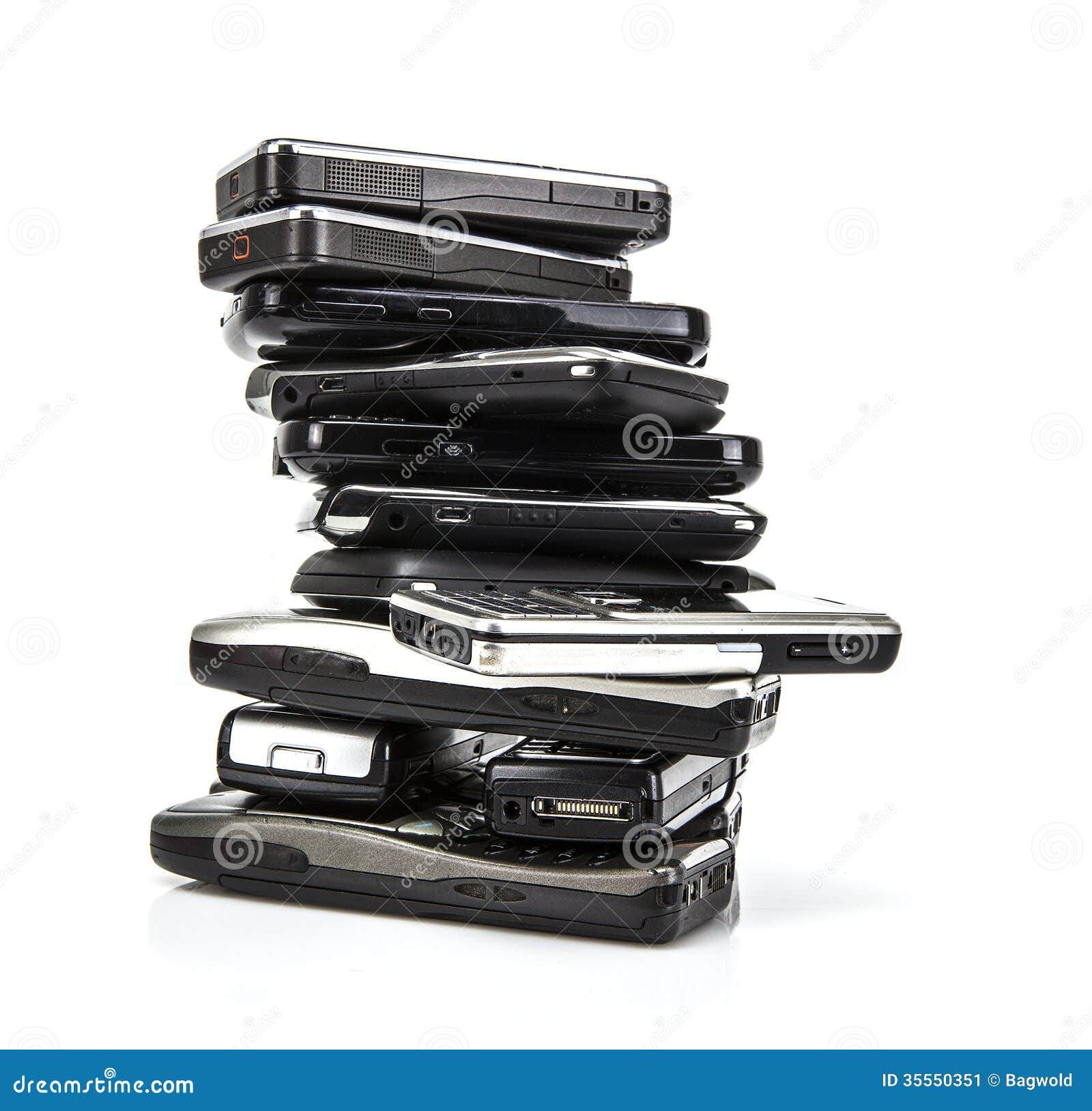 pile of old mobile phones