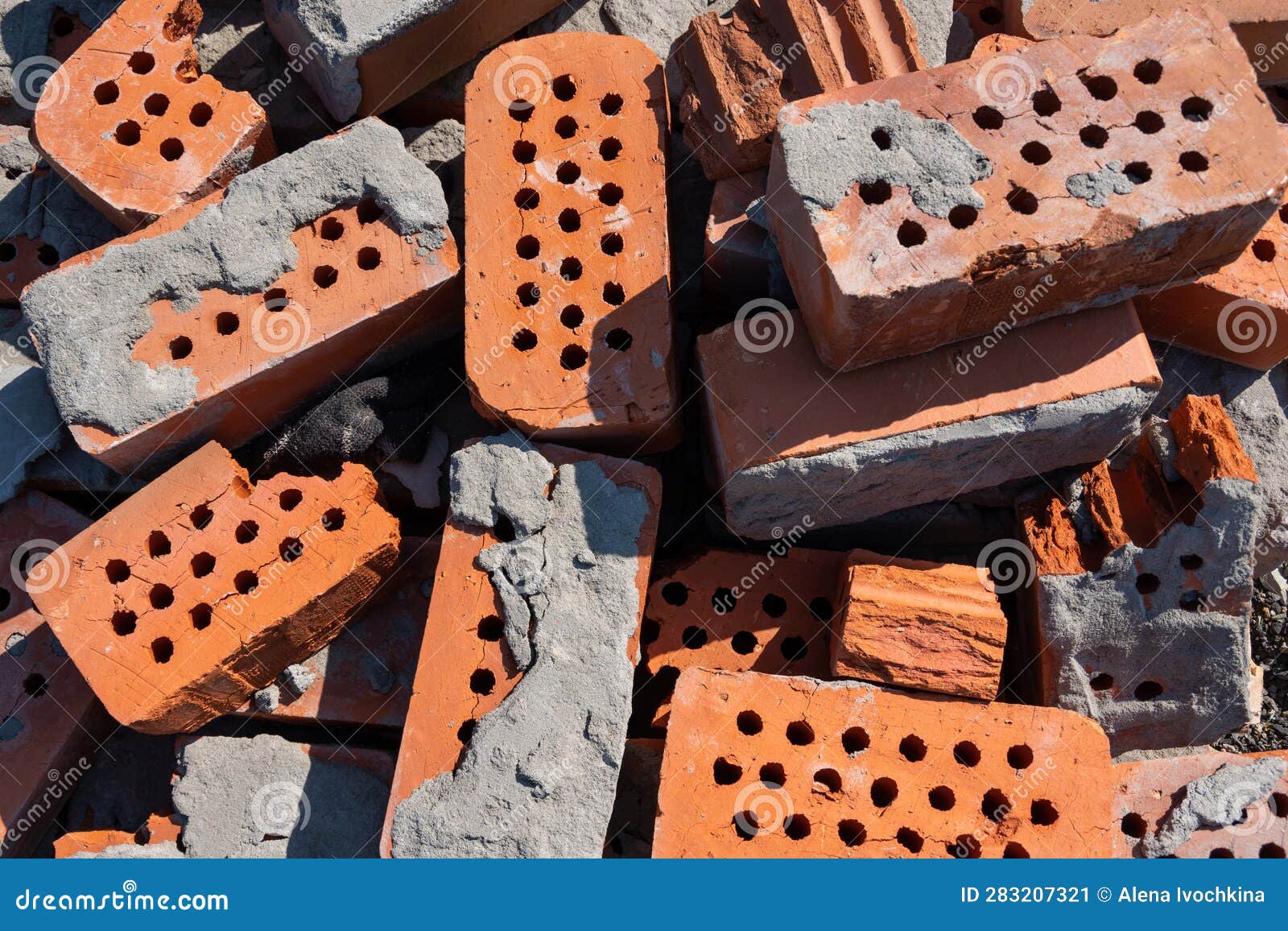A Pile of Old Red Bricks with the Remains of Dried Mortar. Building