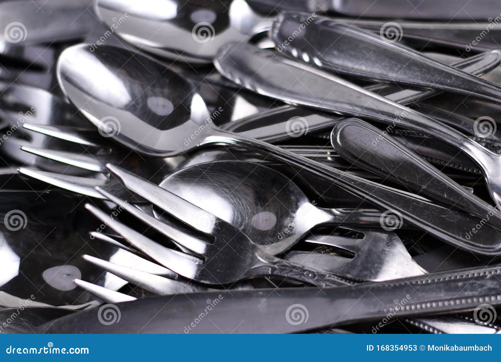 Old Scratched and Dull Flatware in Need of Polishing Stock Image