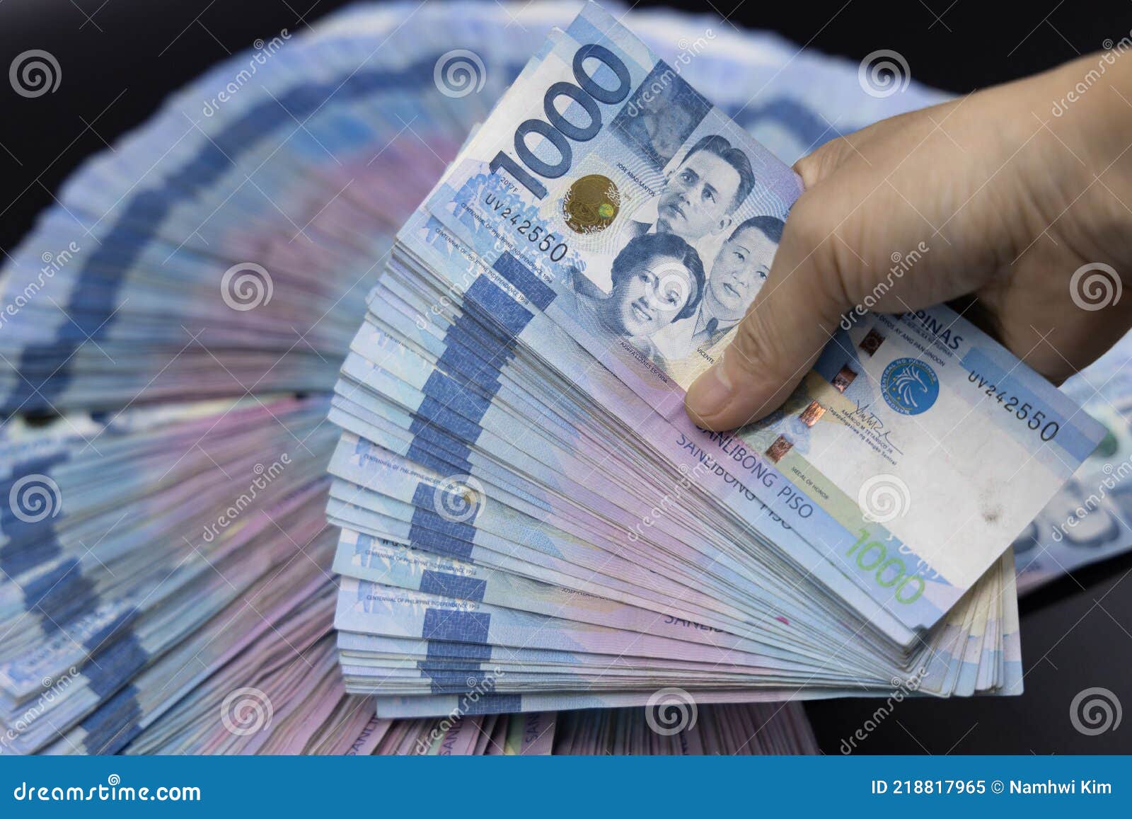 A Pile Of One Thousand Philippines Banknotes. Cash Of Thousand