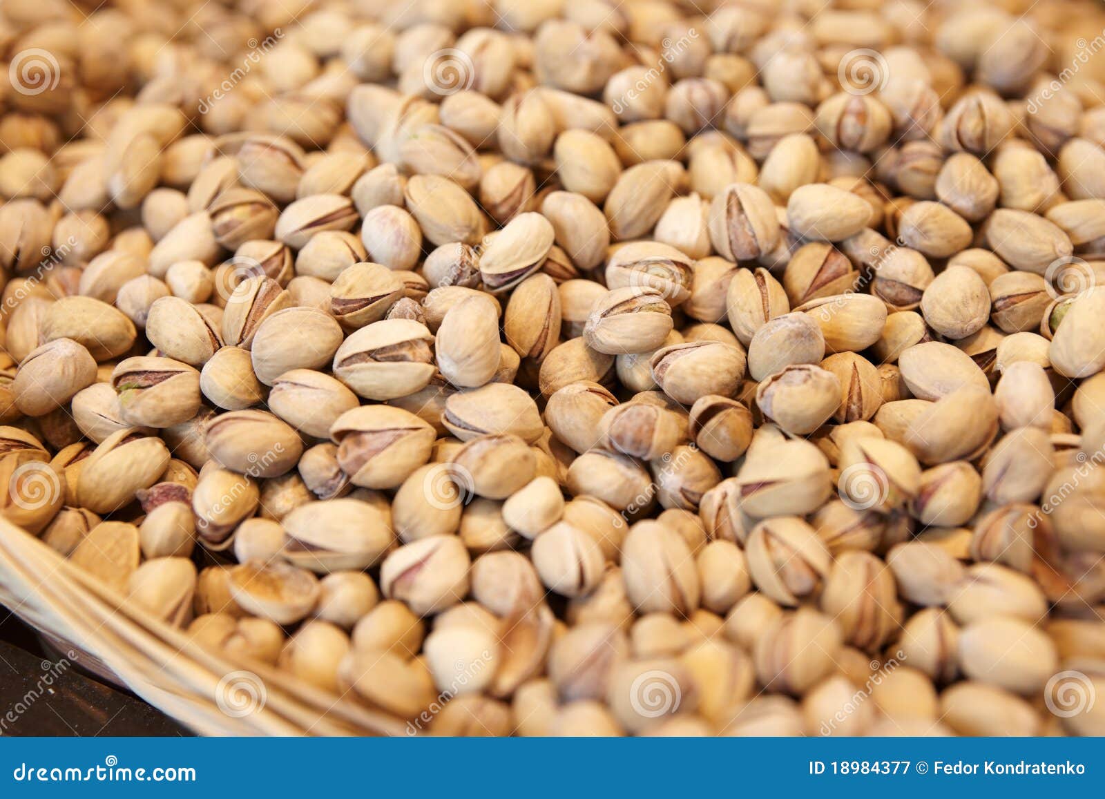 Pile of pistachios, close-up shot, limited focus depth