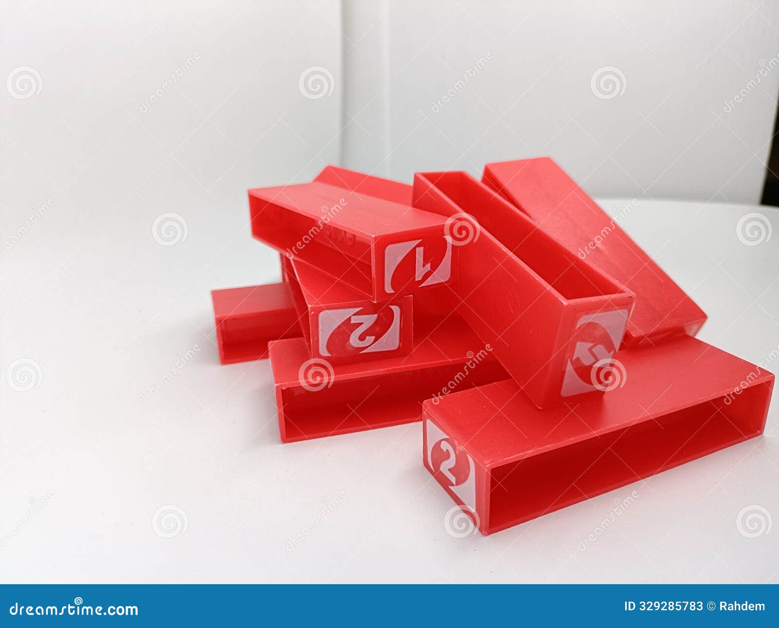 pile of red block pieces on white background