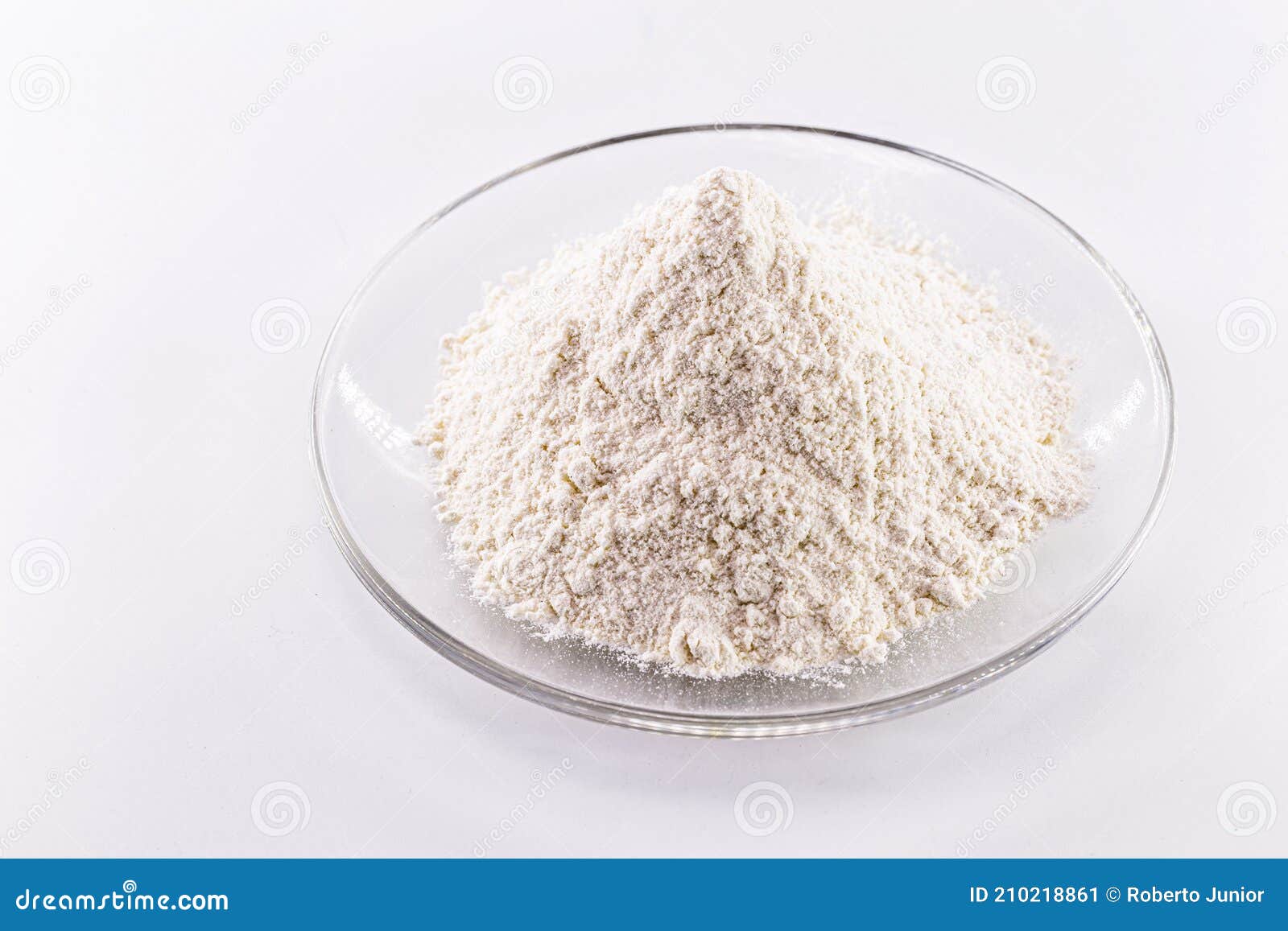 pile of solid potassium chlorate on white background