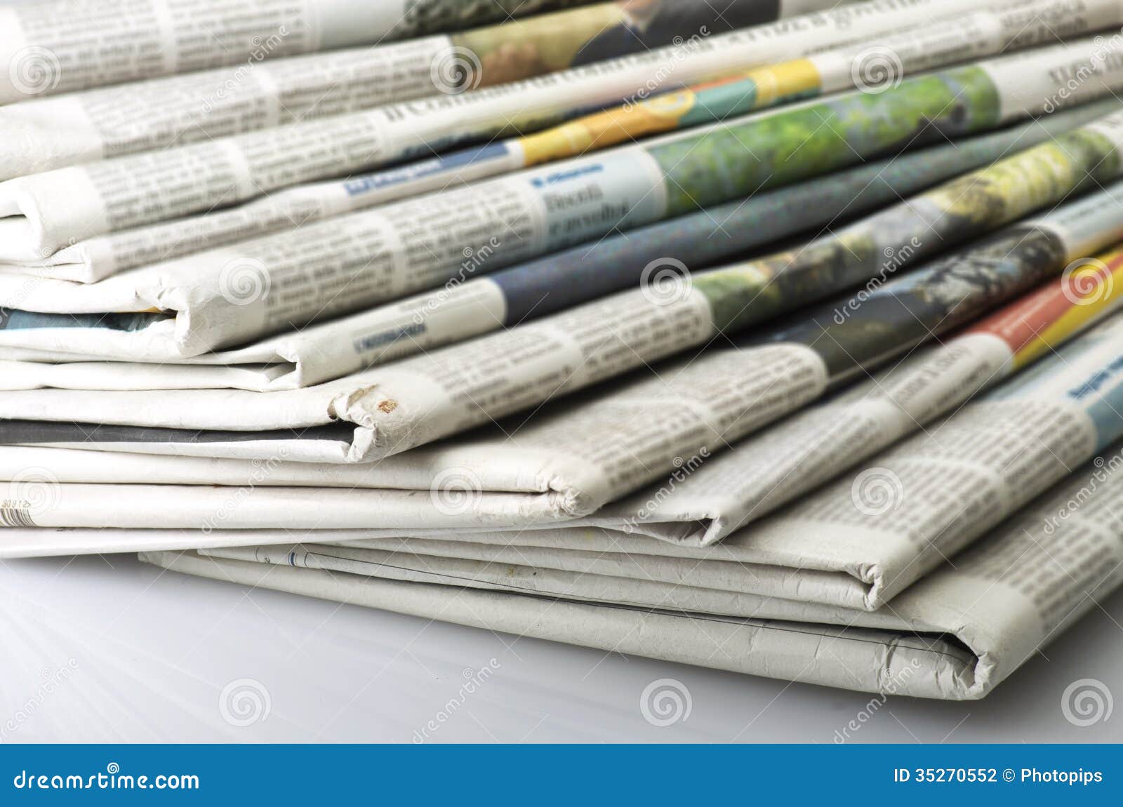 pile of various newspapers