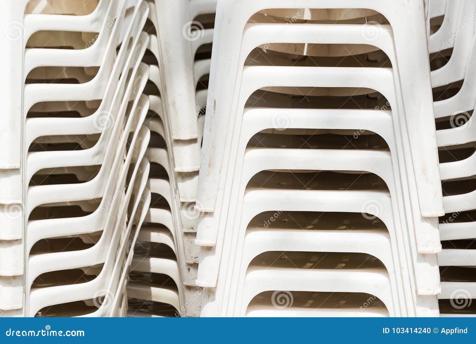 Pile of White Plastic Deck Chairs. Stock Photo Image of heap, chair