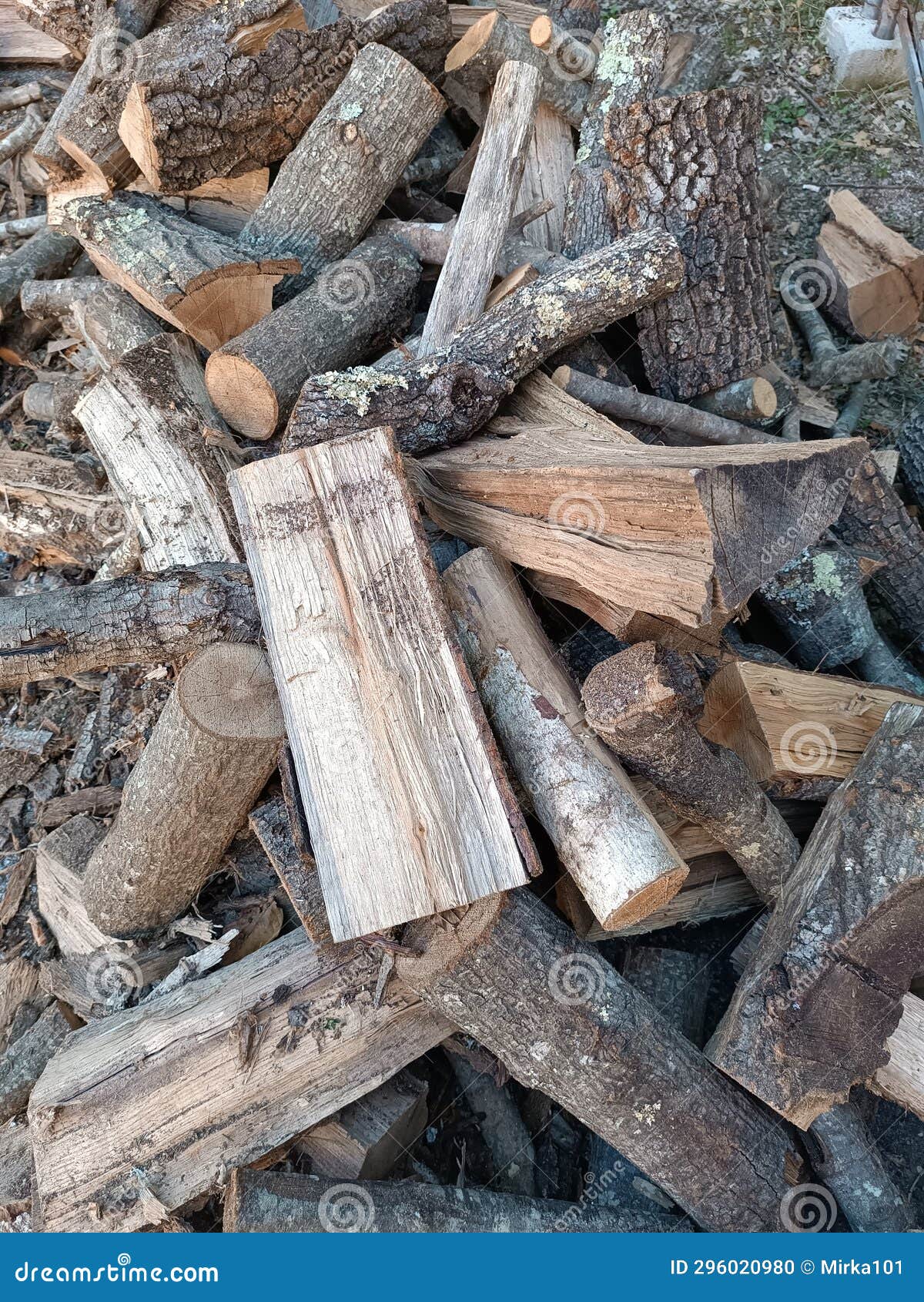 pile of wood logs.  warm background