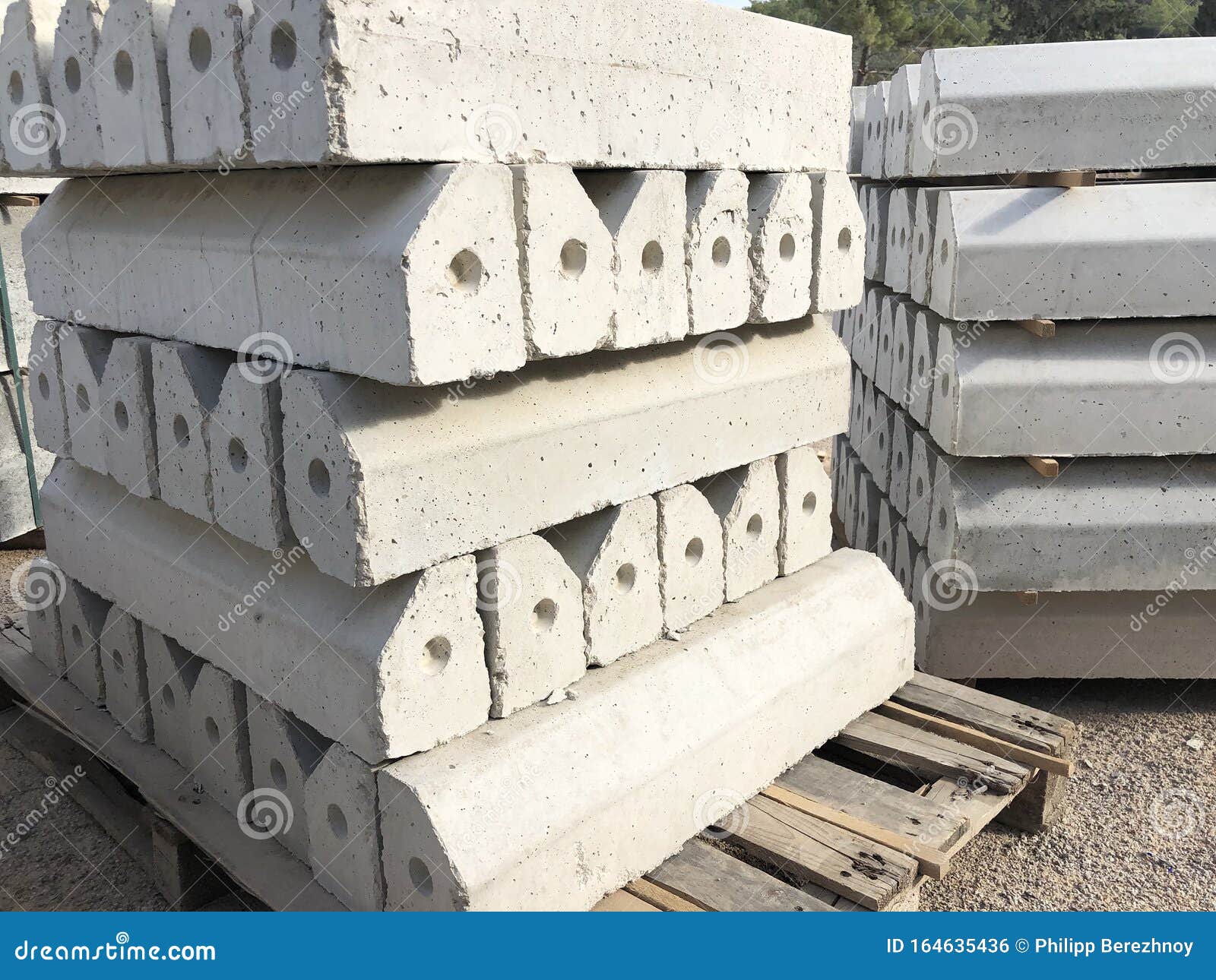 Piled Concrete Curbstones. Construction Material for Road Construction