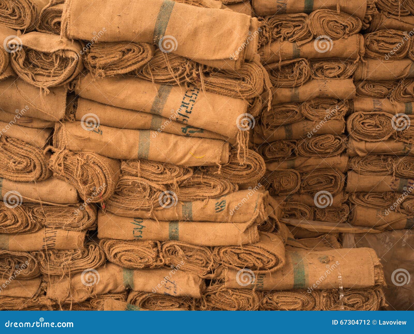 Piles of hemp sacks stock photo. Image of tall, sacks - 67304712