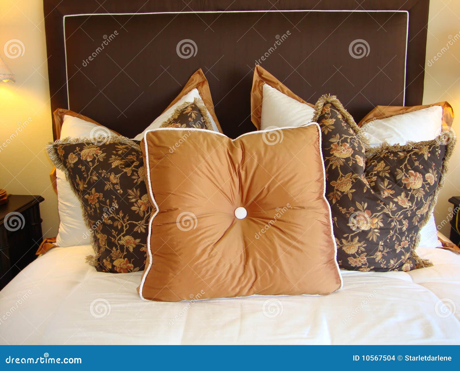 Pillows on Bed stock photo. Image of bedroom, brown, house 10567504