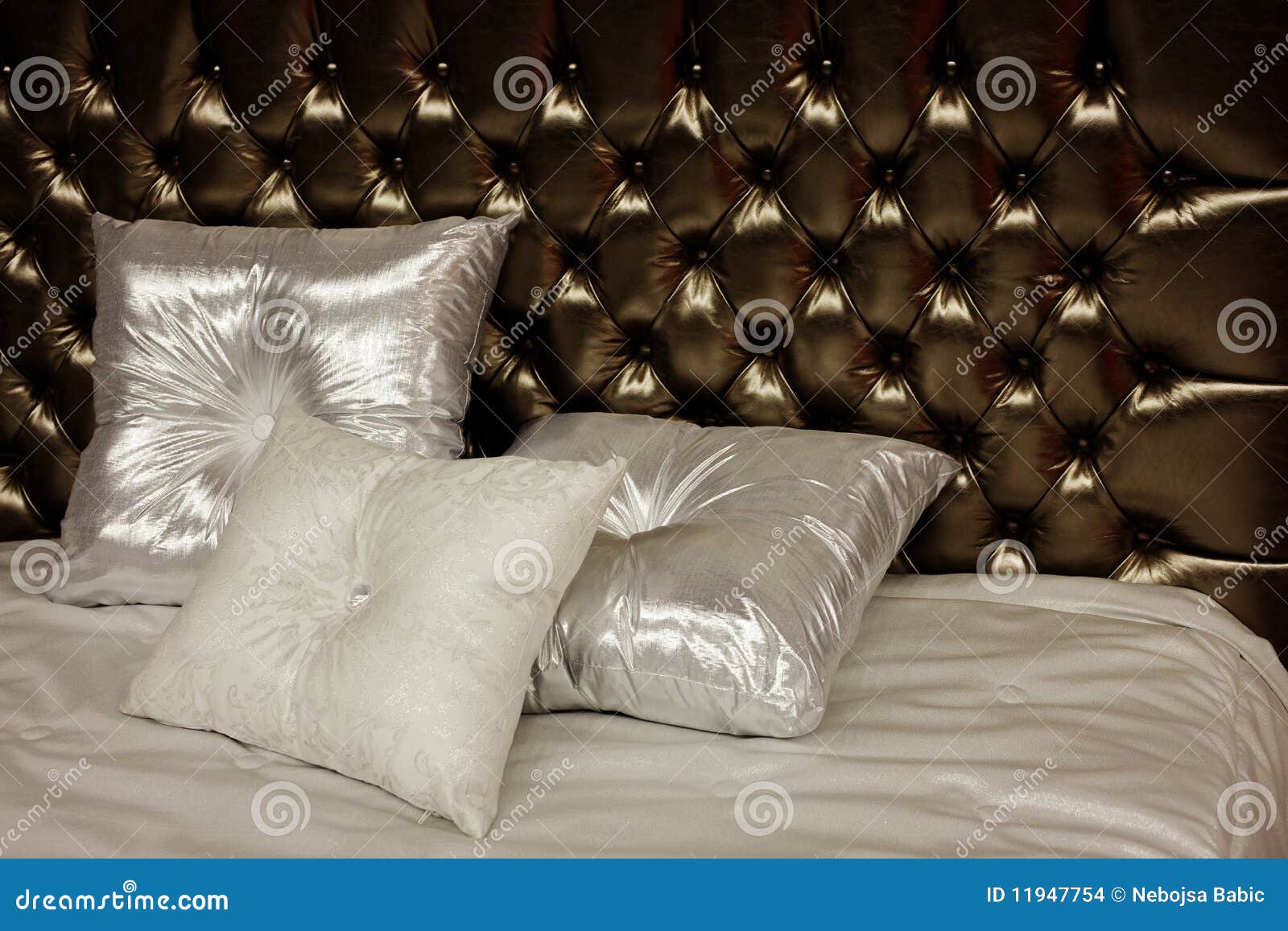 Pillows on a bed stock photo. Image of cloth, luxe, fabric 11947754