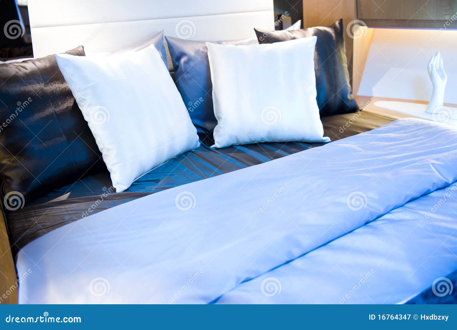 Pillows in bed stock image. Image of duvet, cloth, furnishing 16764347