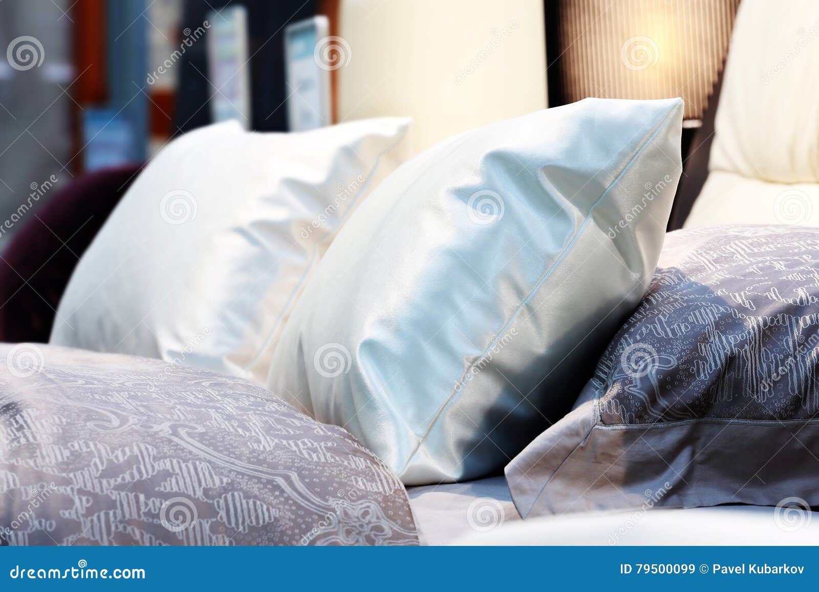 Pillows on the bed stock image. Image of lamp, background 79500099