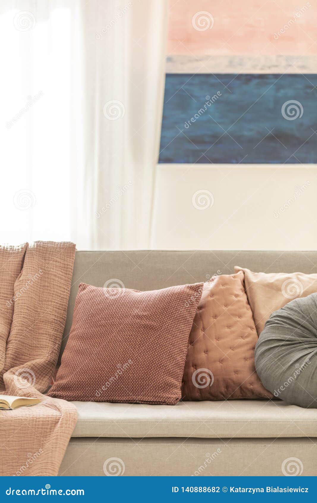 Pillows on Grey Couch, Mockup Painting on the Wall Stock Photo Image