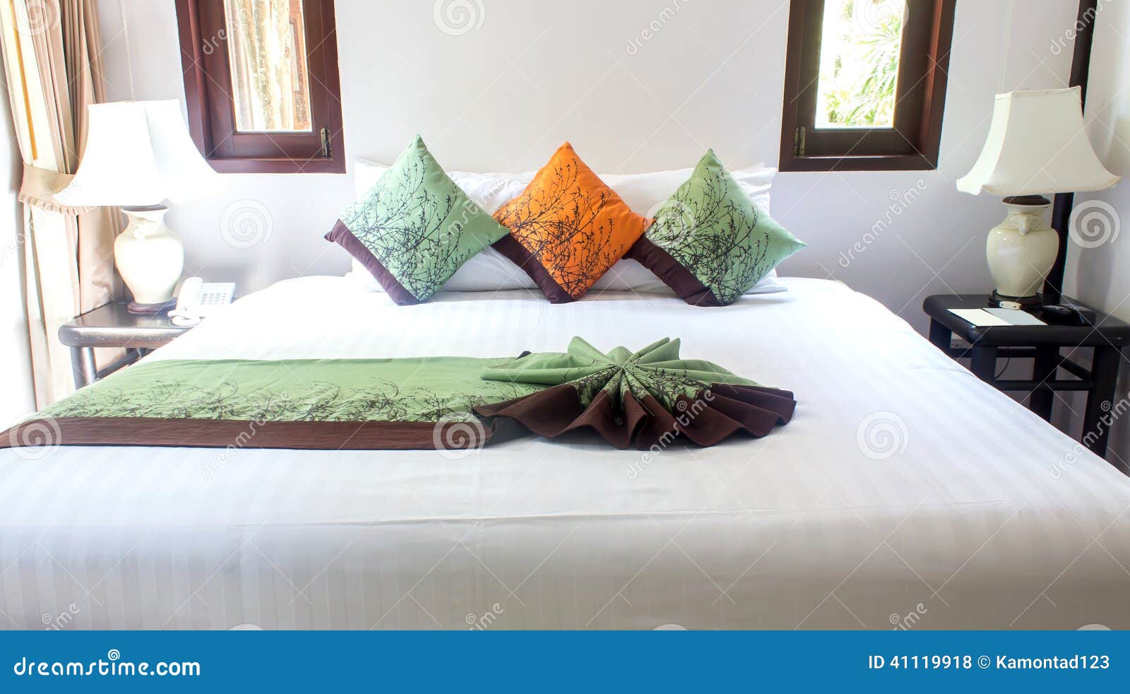 Pillows on white bed. stock photo. Image of comfort, three 41119918