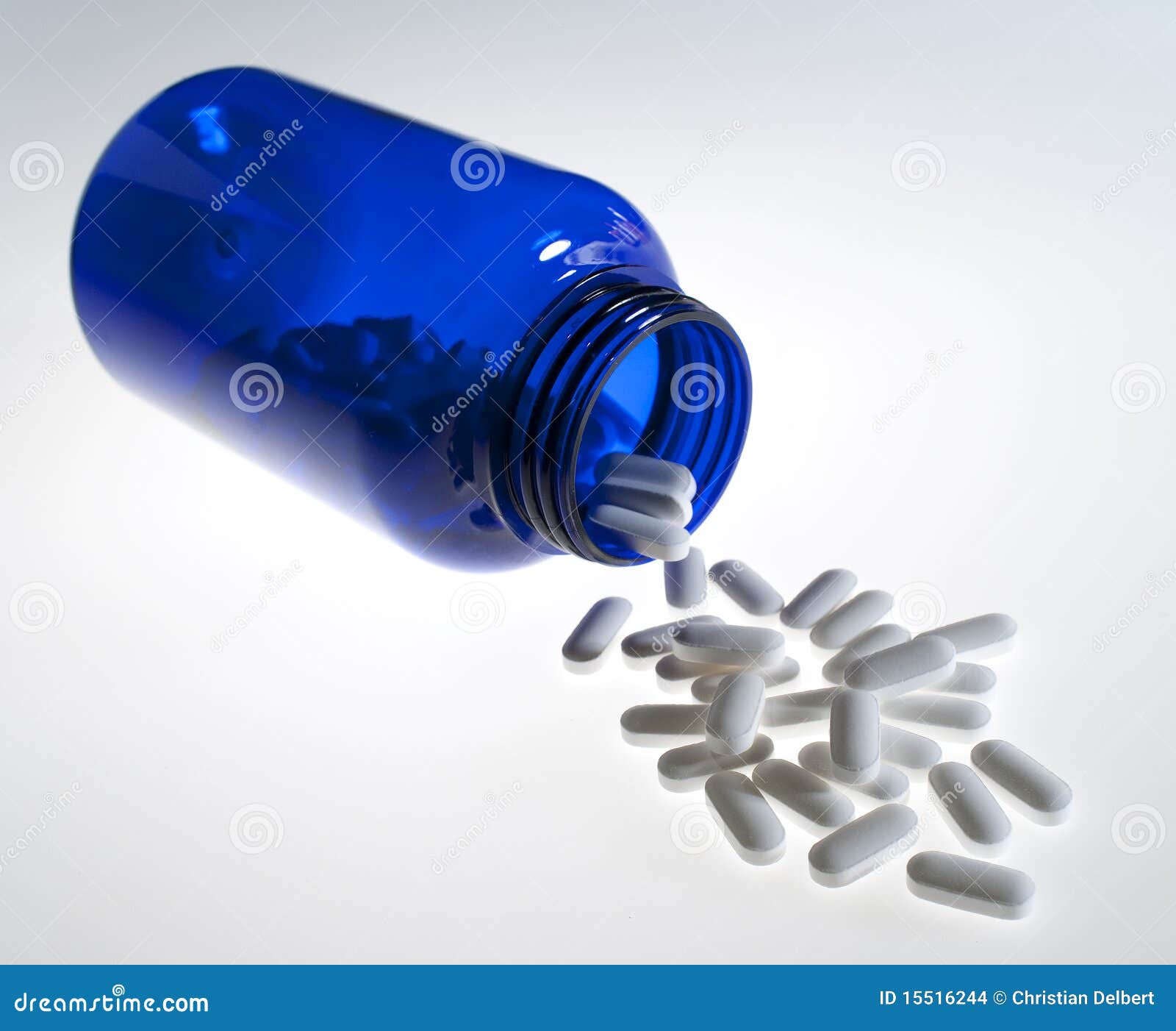 Pills and Blue Bottle on White Stock Photo Image of healthcare