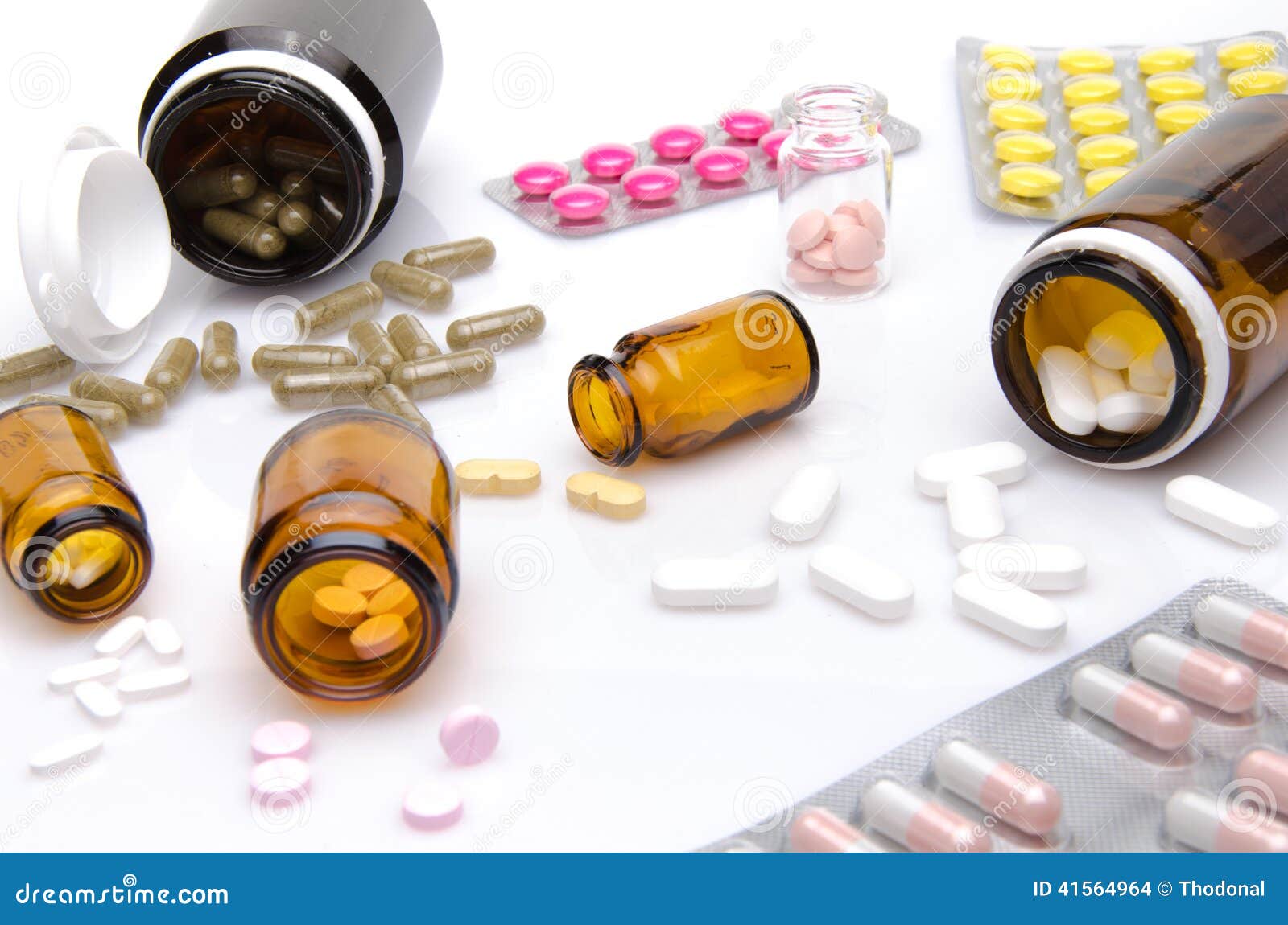 Pills and Capsules Spilling Out of Pill Bottle Stock Photo Image of