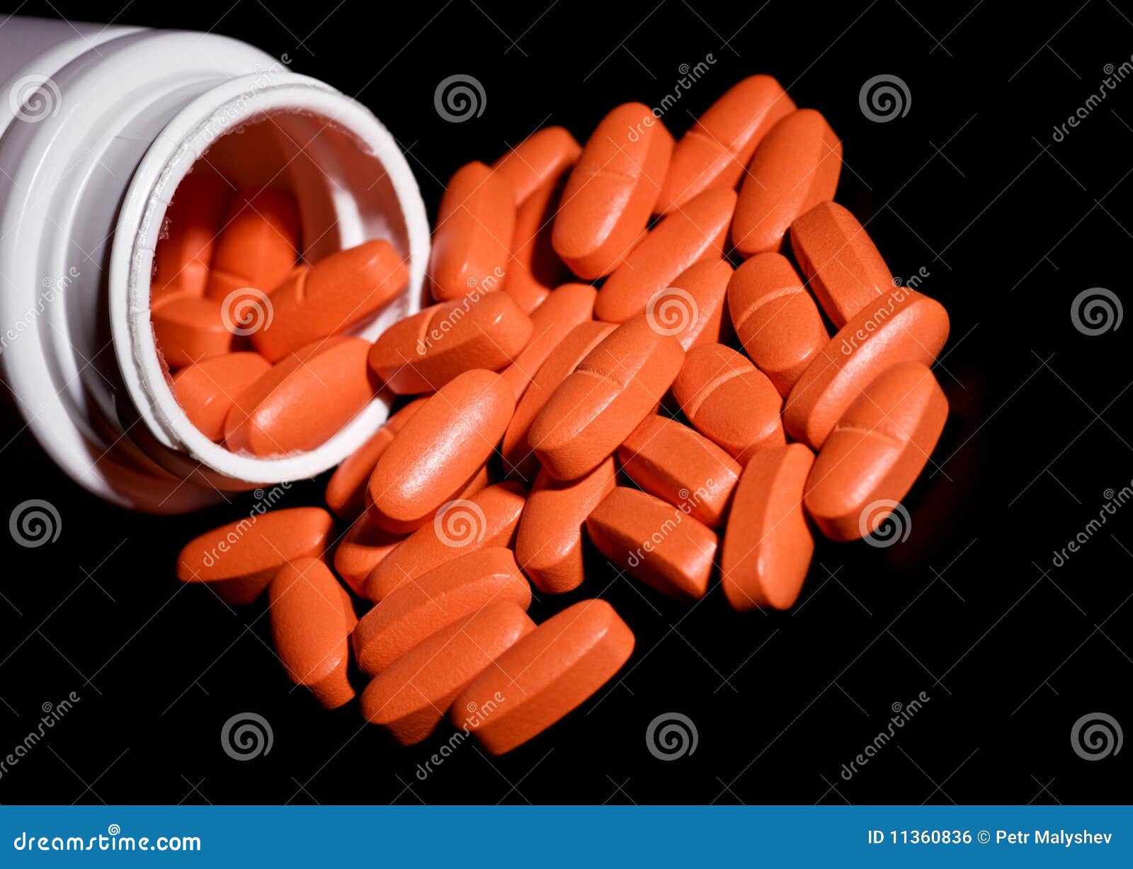 Pills spilling from bottle stock photo. Image of drug 11360836