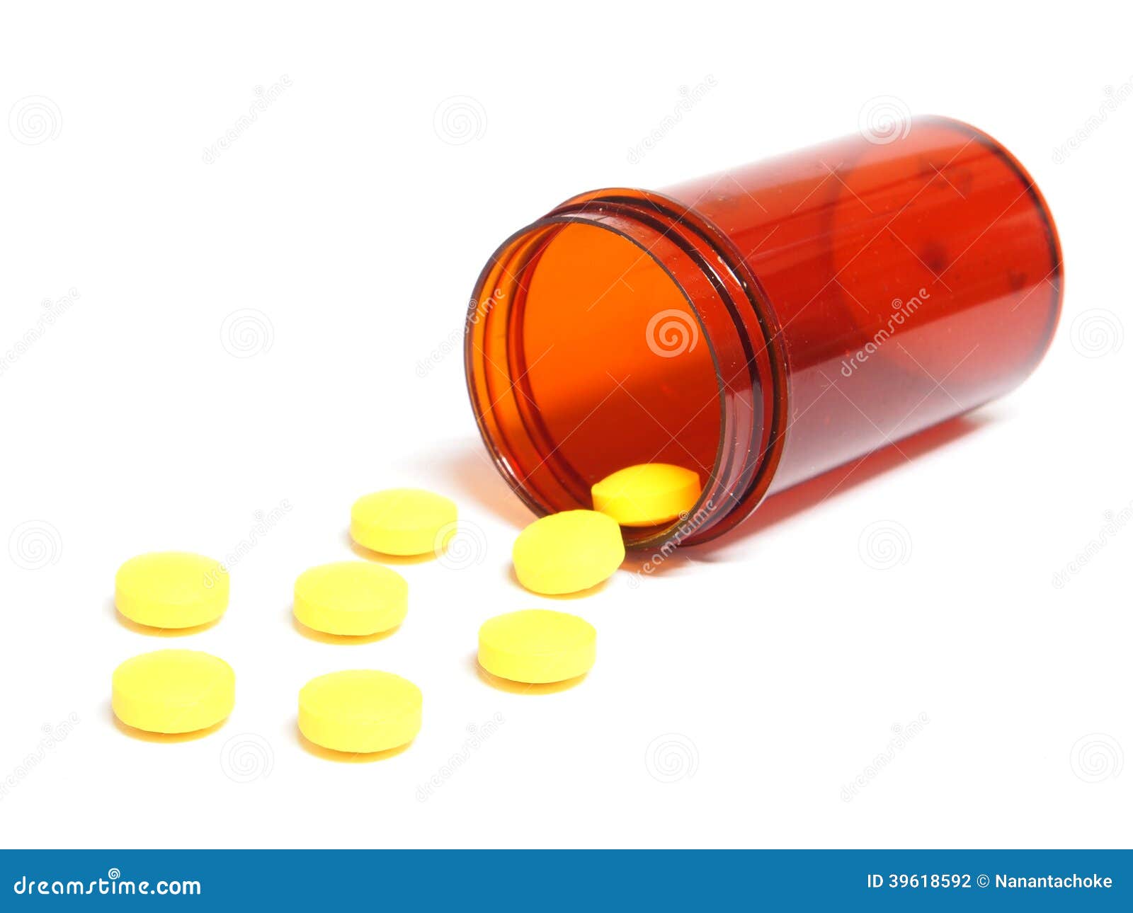 Pills Spilling Out of a Pill Bottle on White Stock Photo Image of