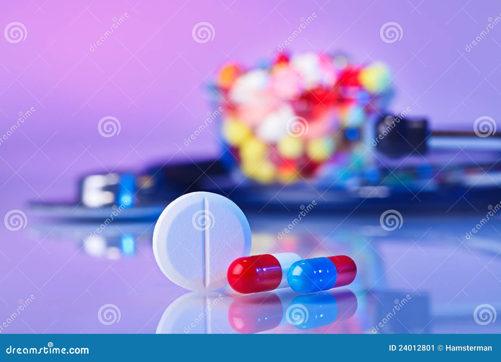 pills and tablets macro still life on violet