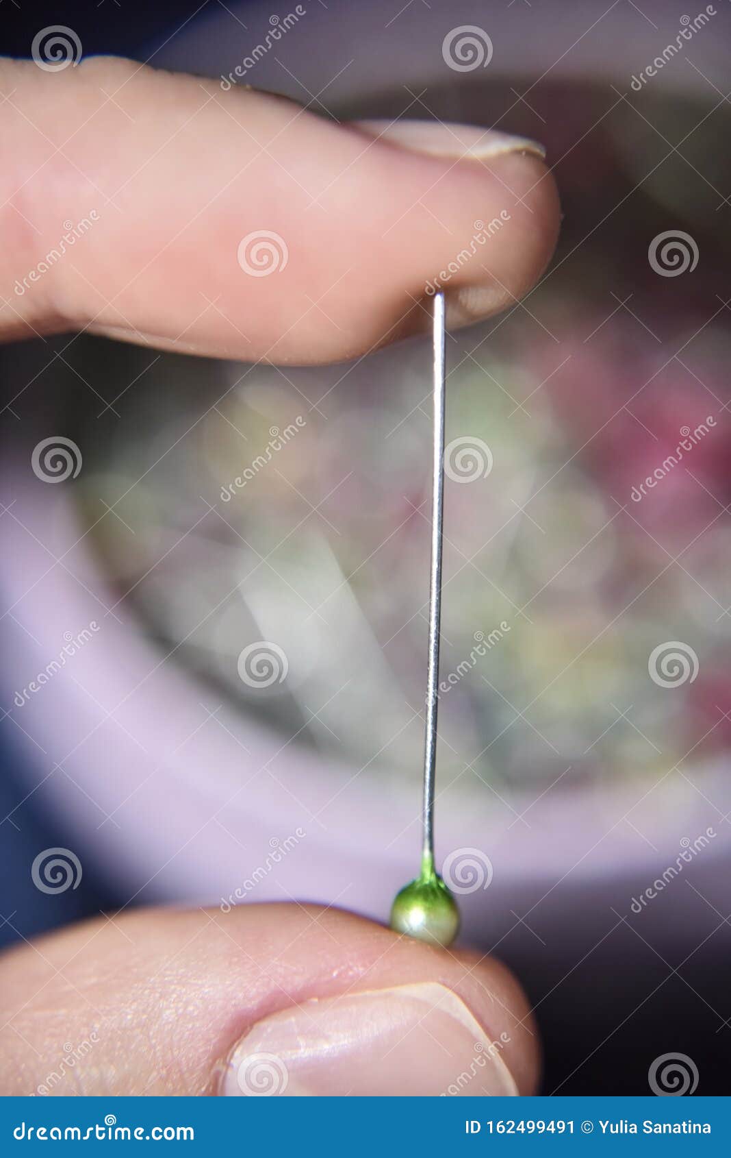 Pin with Green Head Held with Two Fingers Stock Image Image of unsafe