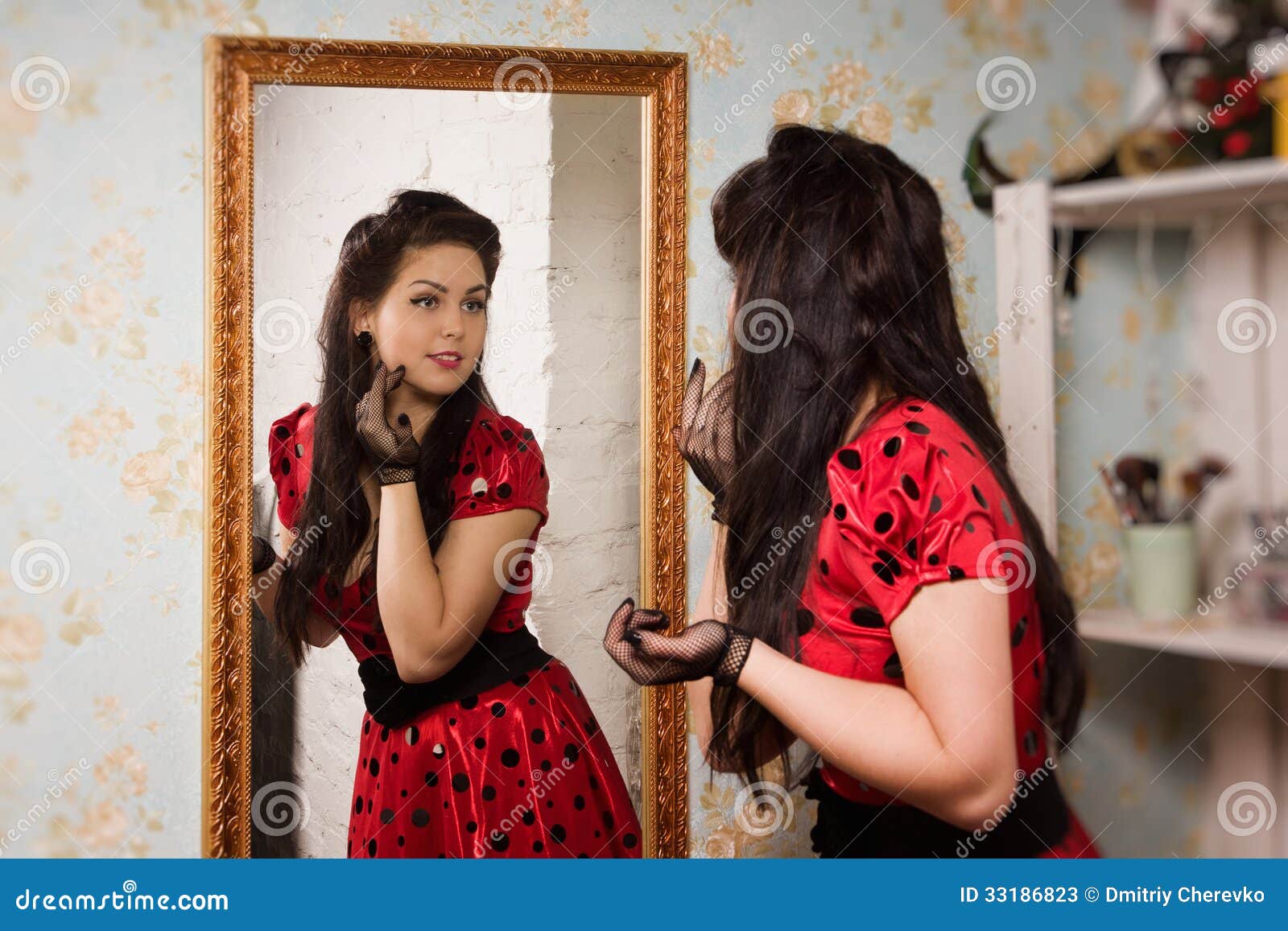 girl in front of mirror