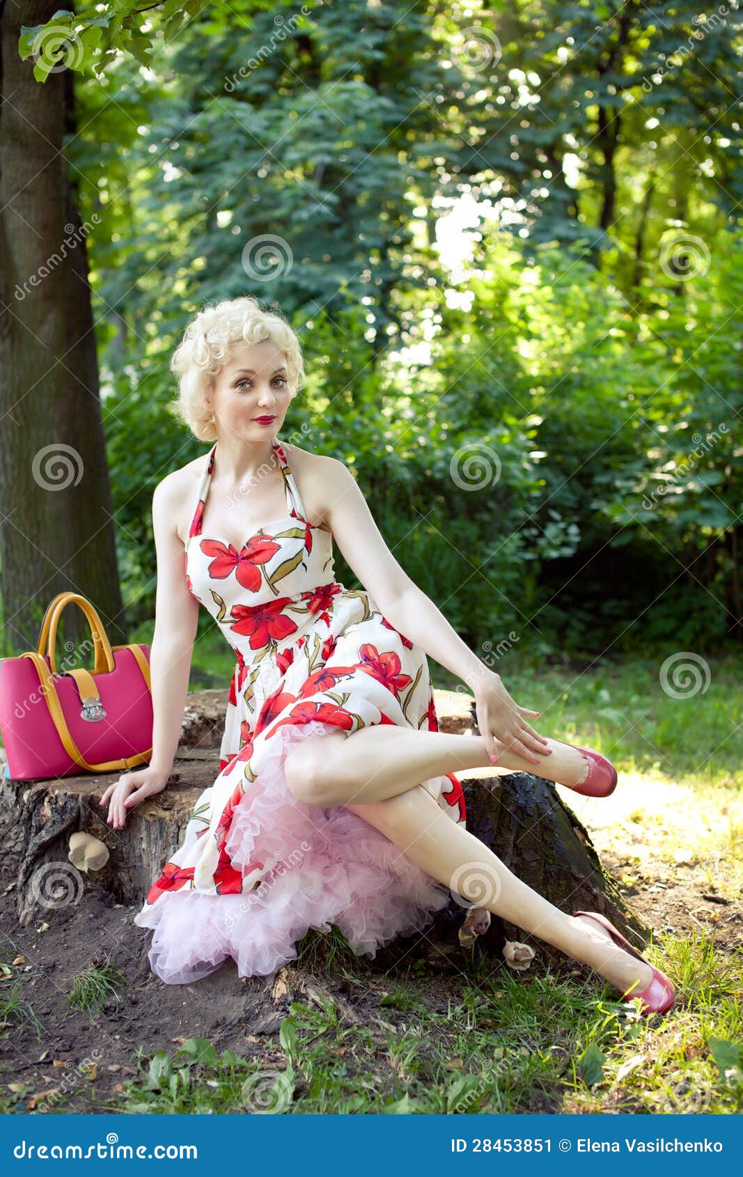 Pin up girl posing in park stock image. Image of pinup 