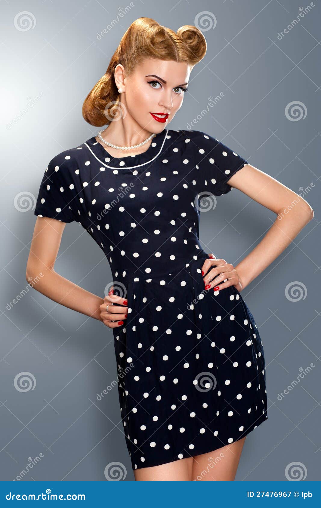 Pin-up Girl In Retro Vintage Dress Posing Stock Image 