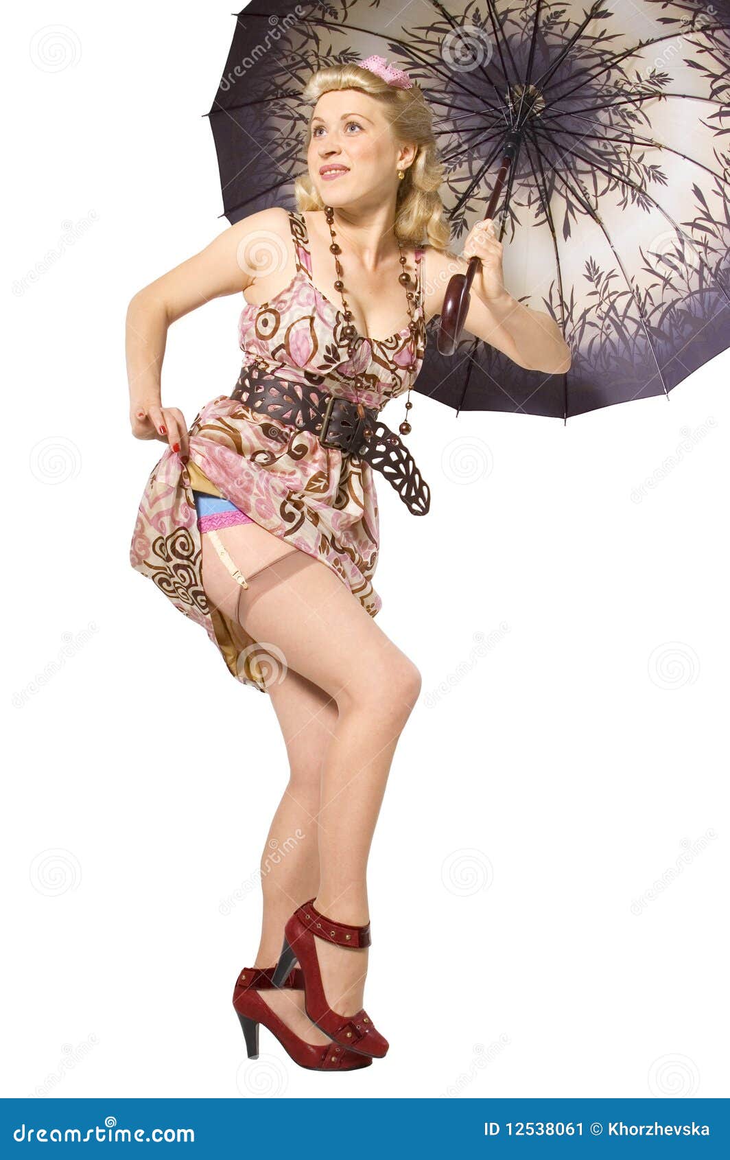 Pinup girl with umbrella stock image. Image of dress 12538061