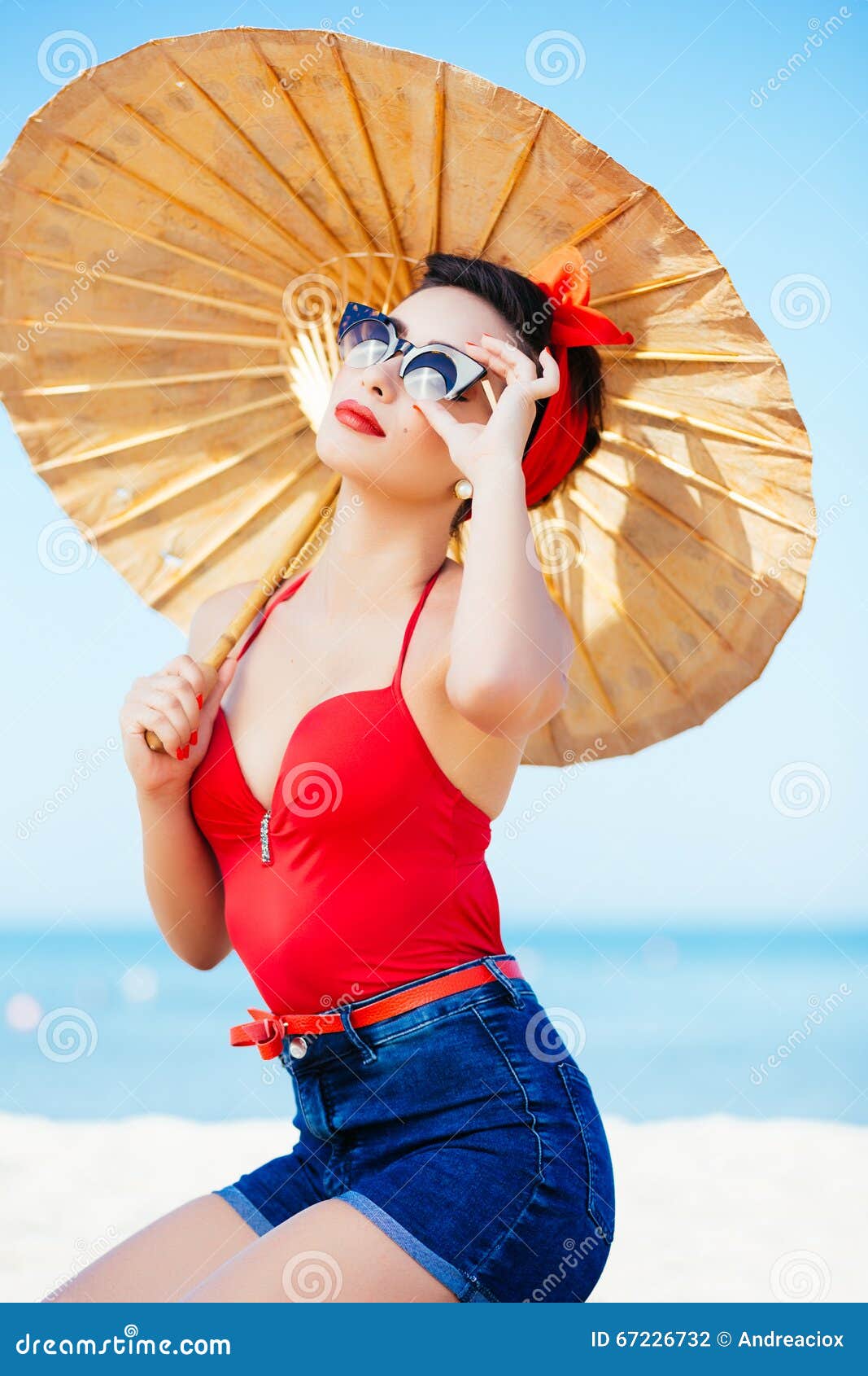 Pinup at Sea with Umbrella Stock Photo Image of buoy, shorts 67226732