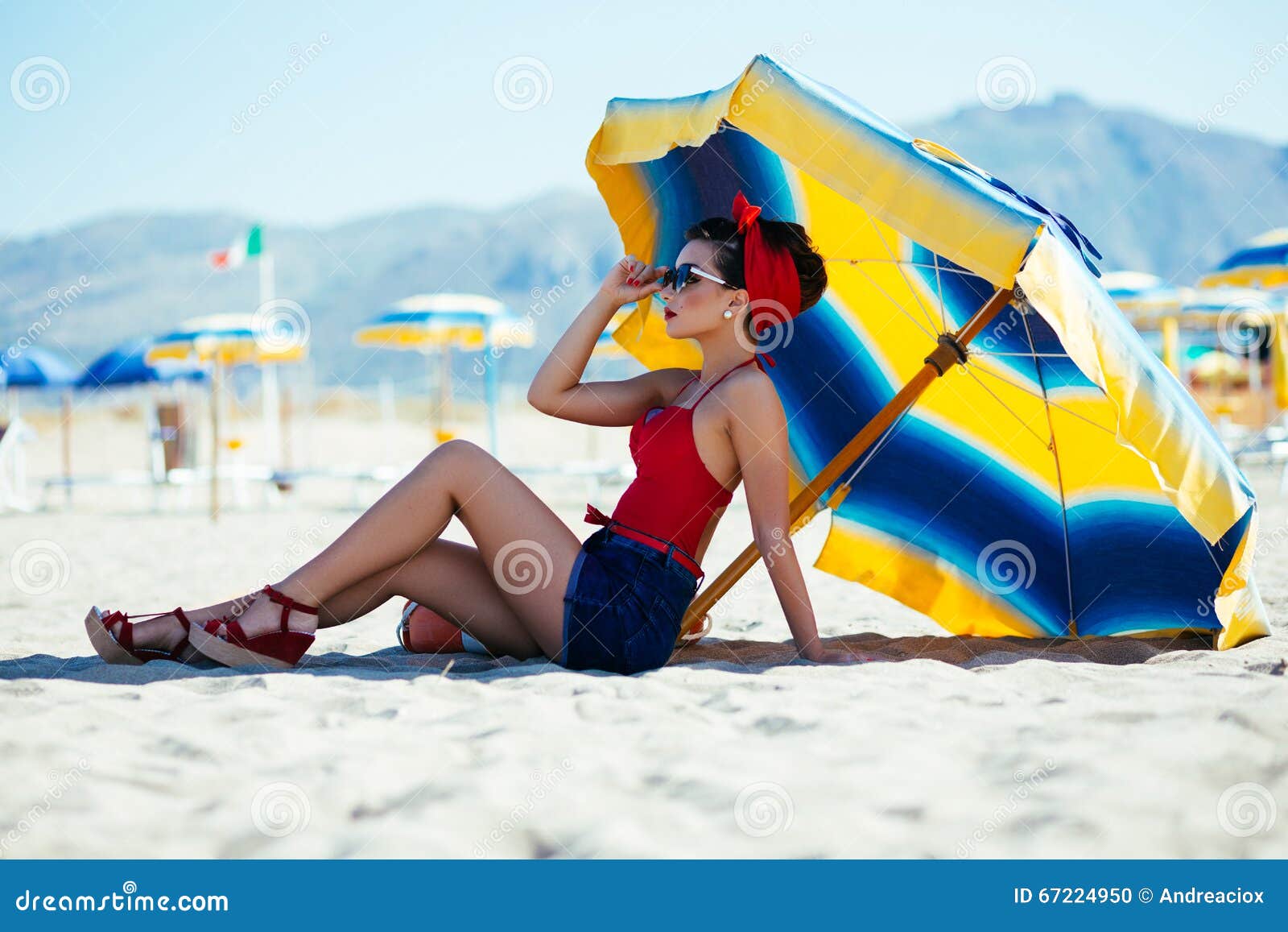 Pinup under umbrella stock photo. Image of posing, beautiful 67224950