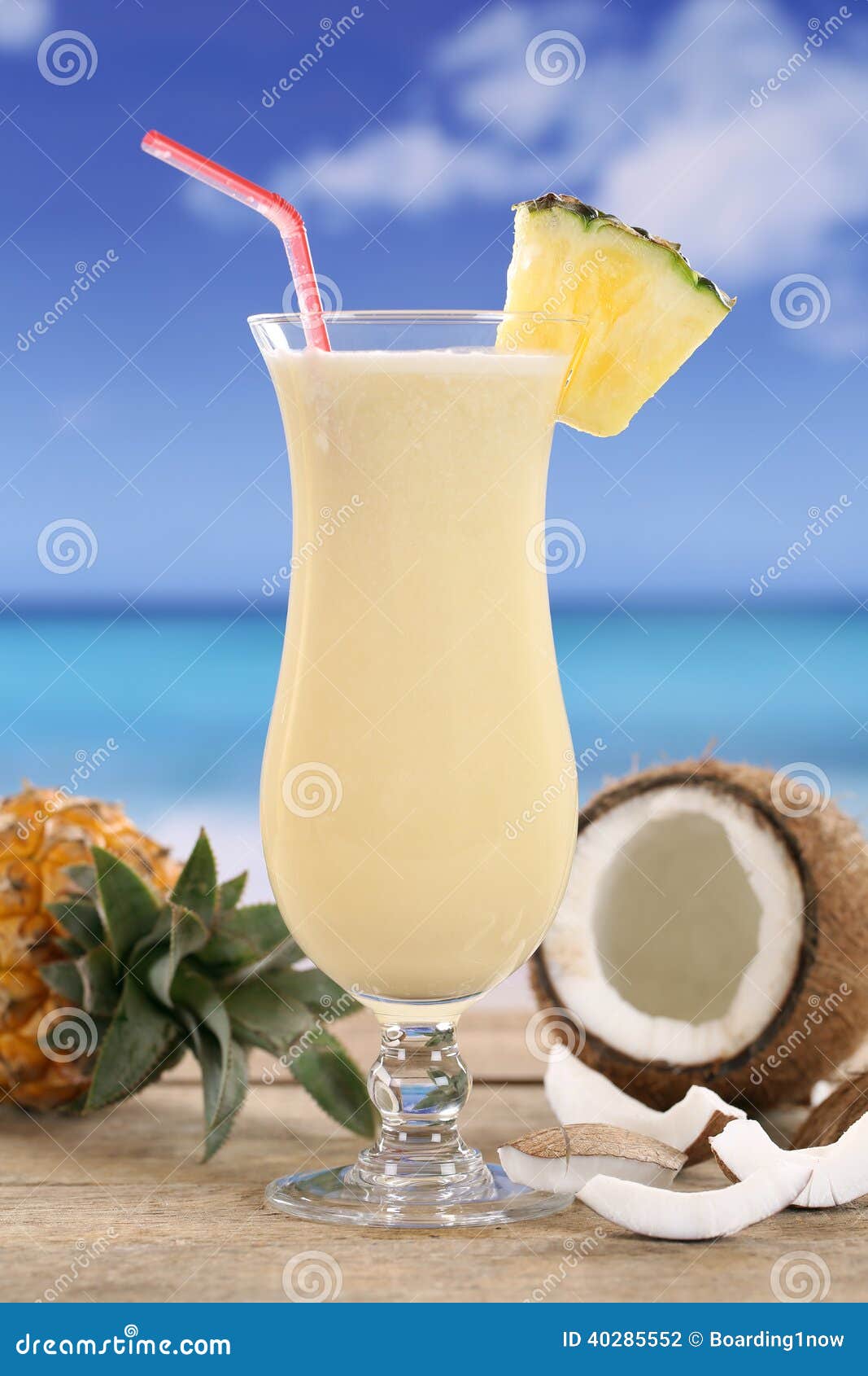 pina colada cocktail with fruits on the beach