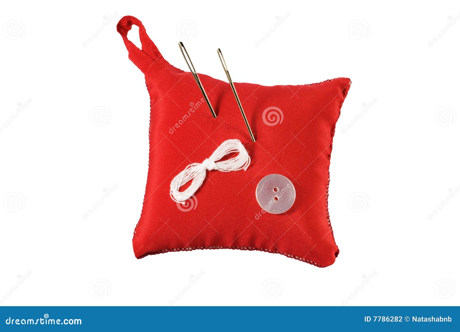 Pincushion, Needle, Thread And Button RoyaltyFree Stock Image