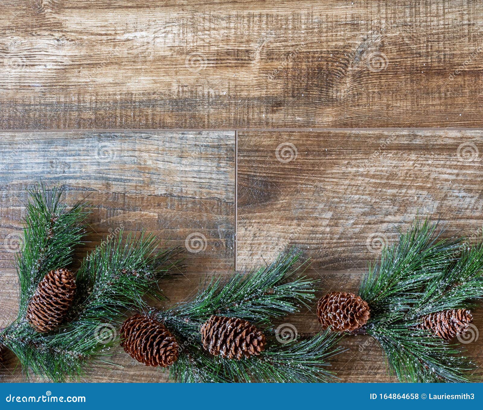 Pine Border with Pine Cones on Rustic Wood Background Stock Photo ...