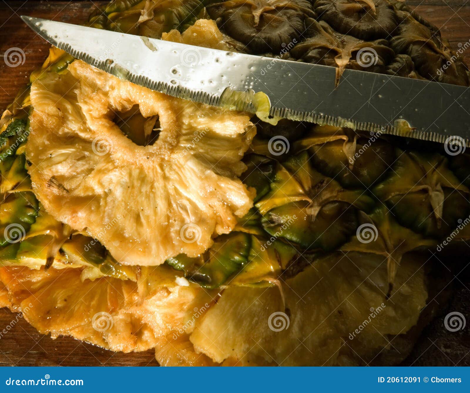 Pineapple chips and knife stock image. Image of snack 20612091