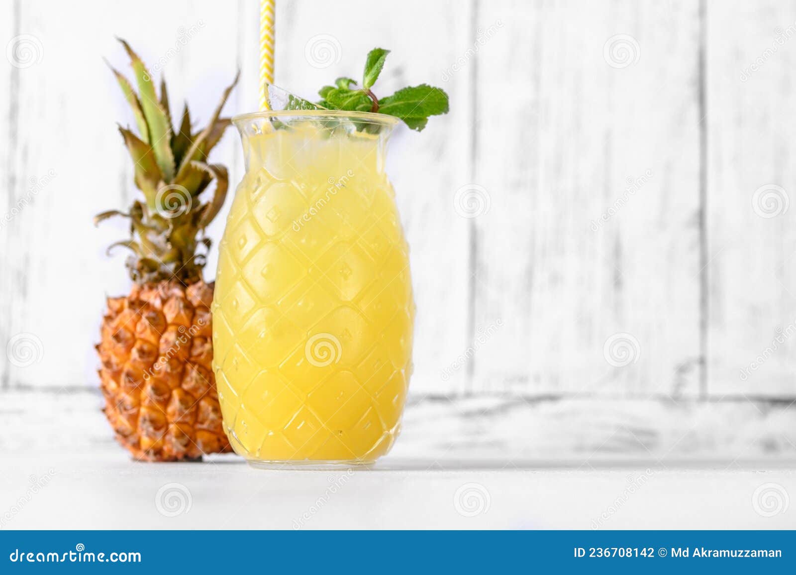 Glass of Pineapple, Style Cocktail on White Background Stock Photo