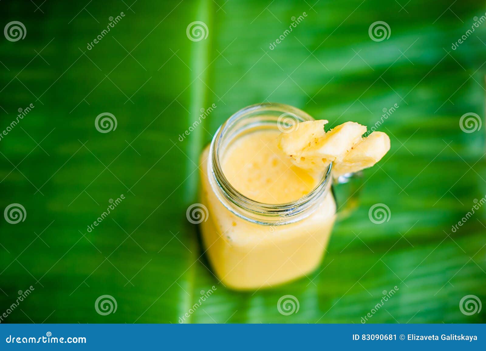 Pineapple Cocktail with a Slice of on Banana Leaf. Tropical Concept