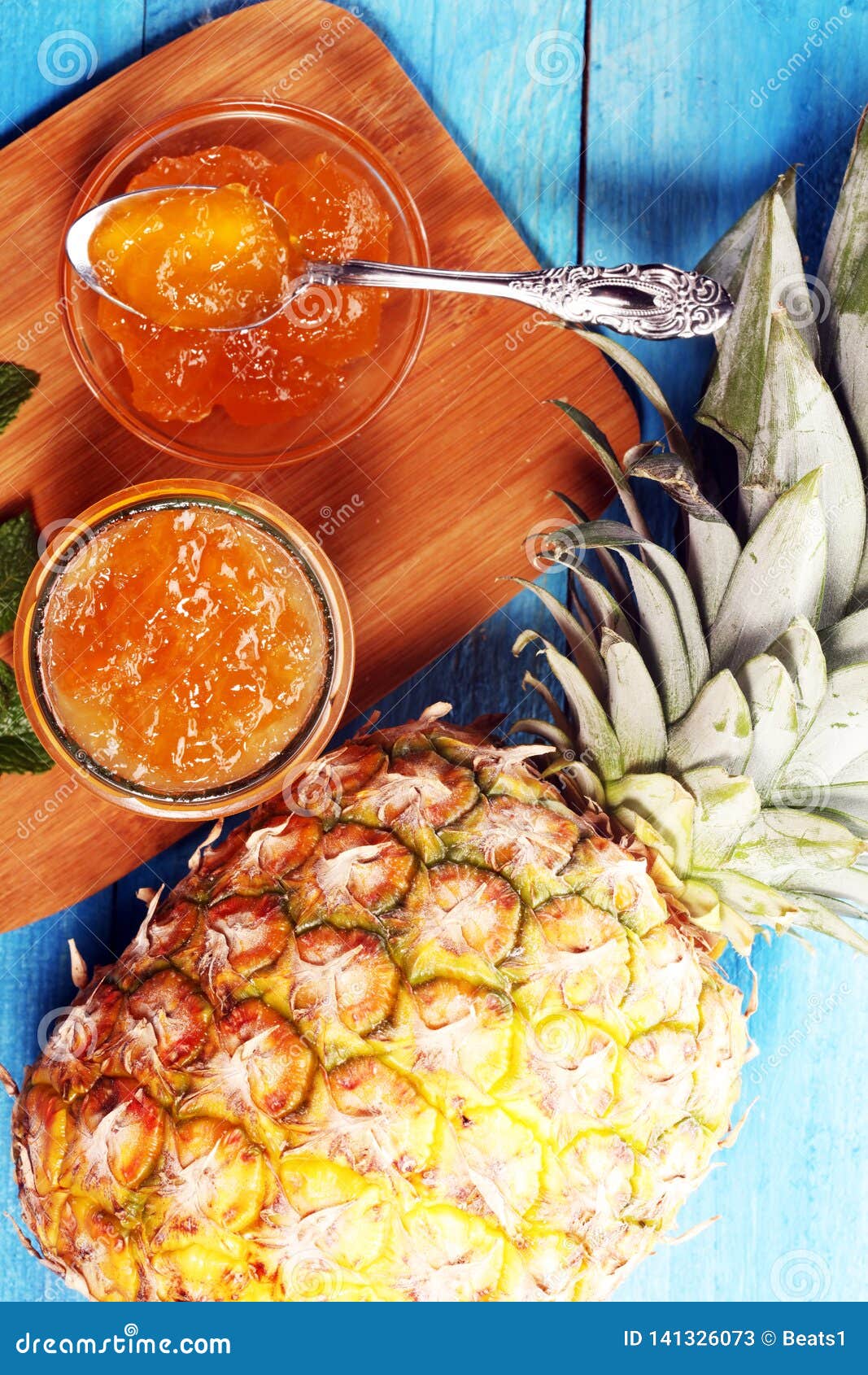 Pineapple Jam with Fresh Pineapple and Mint. Marmalade on Spoon and Jar