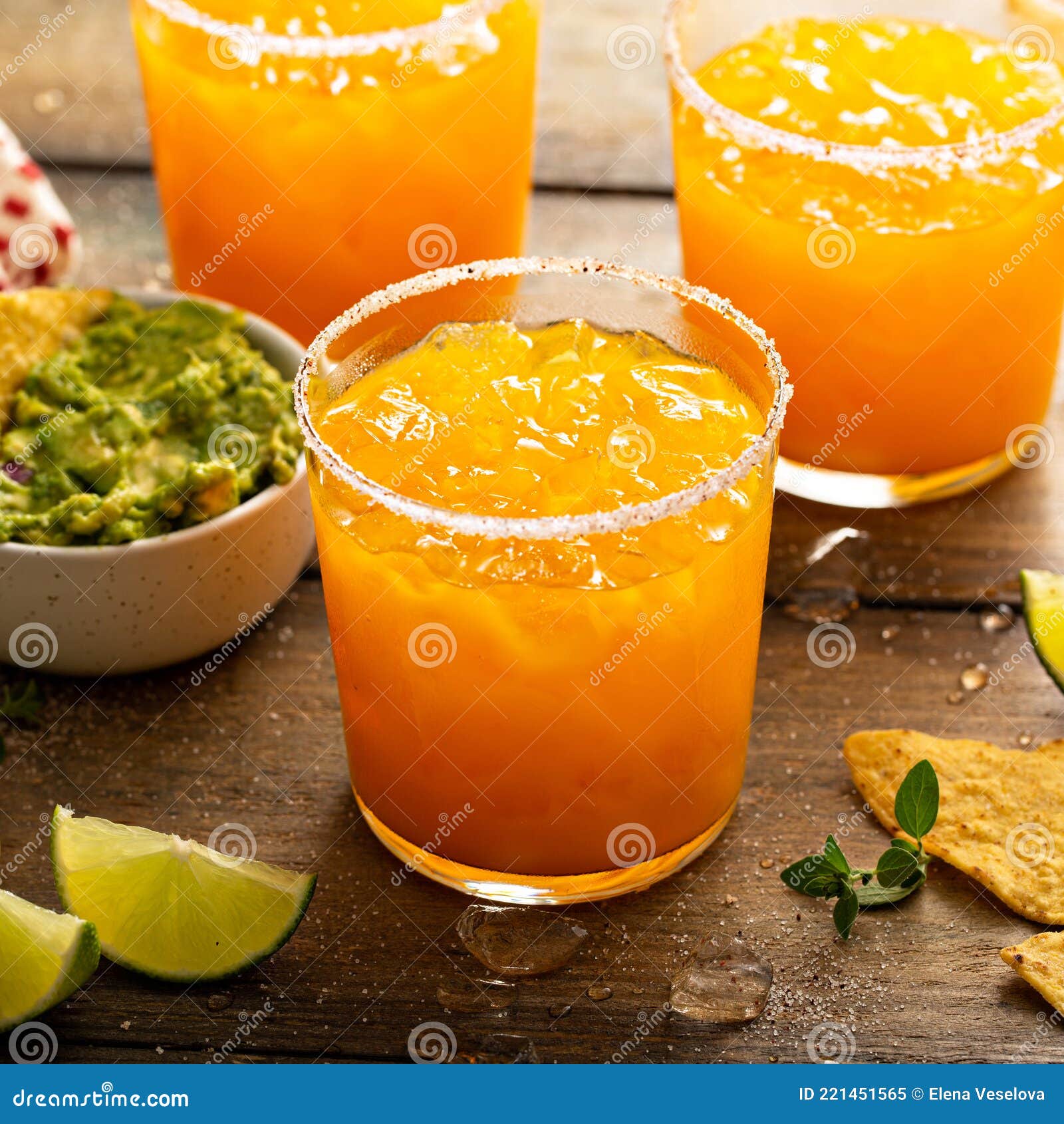 Pineapple and Mango Margarita with Chips and Guacamole Stock Image