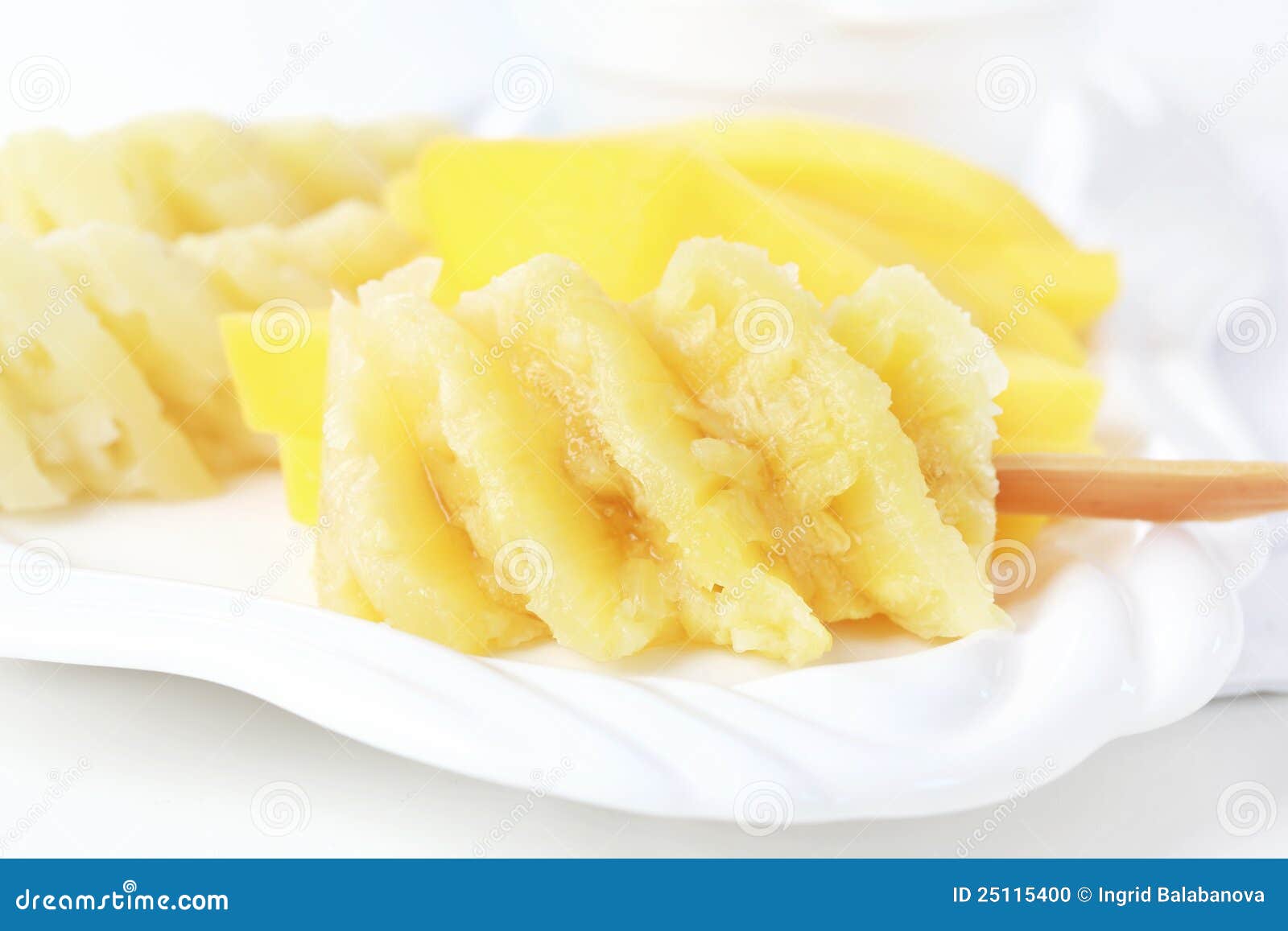 Pineapple on stick stock photo. Image of gourmet, closeup 25115400