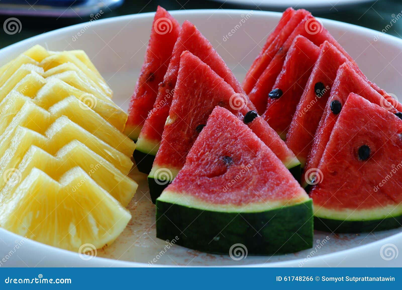Pineapple and watermelon stock photo. Image of plate 61748266