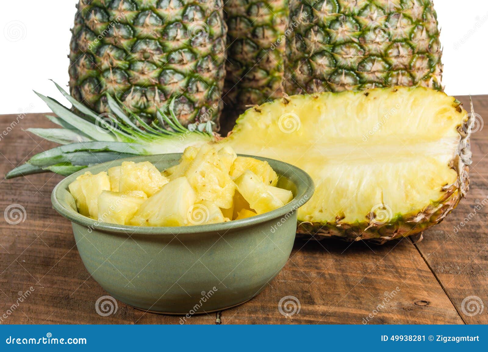 Pineapples and Bowl of Cut Fruit Stock Image Image of organic