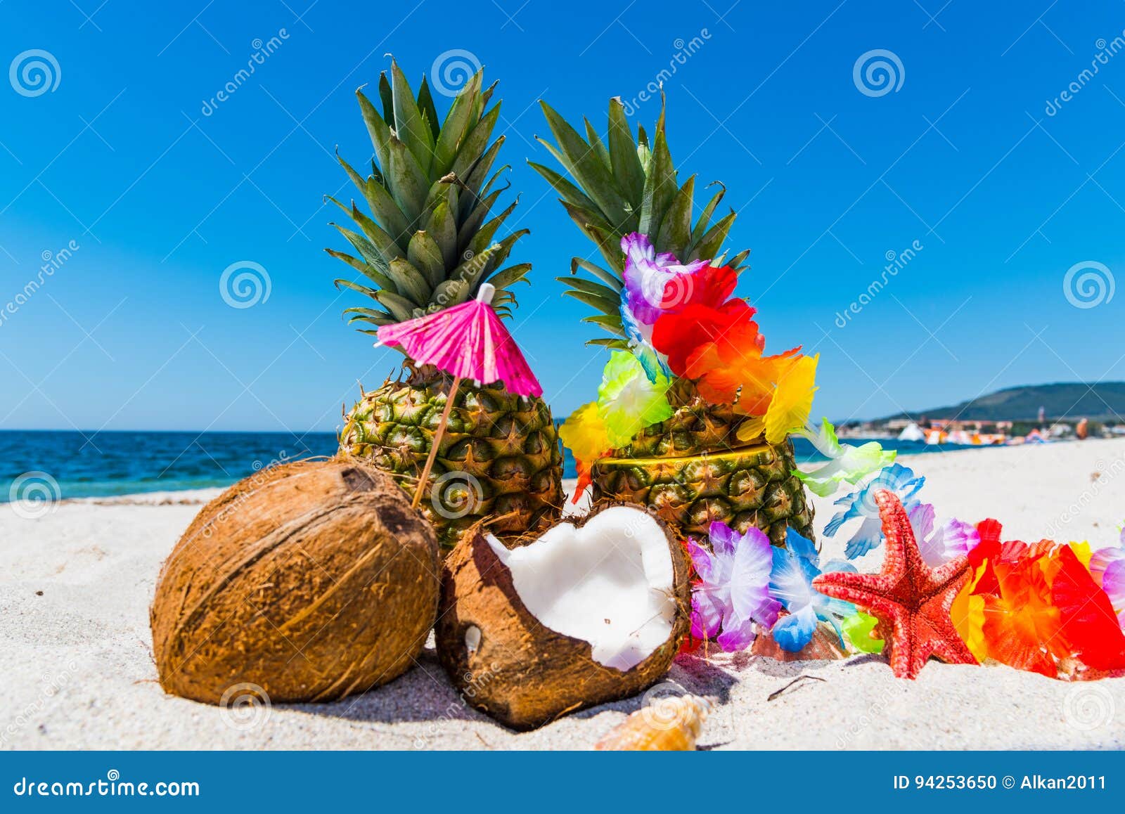 Pineapples and Coconuts on the Sand Stock Photo Image of summertime
