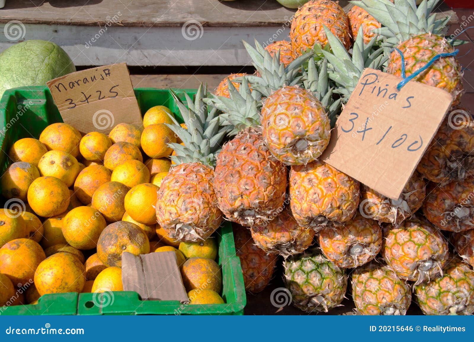 Pineapples and Oranges for Sale at Fruit Stand Stock Photo Image of